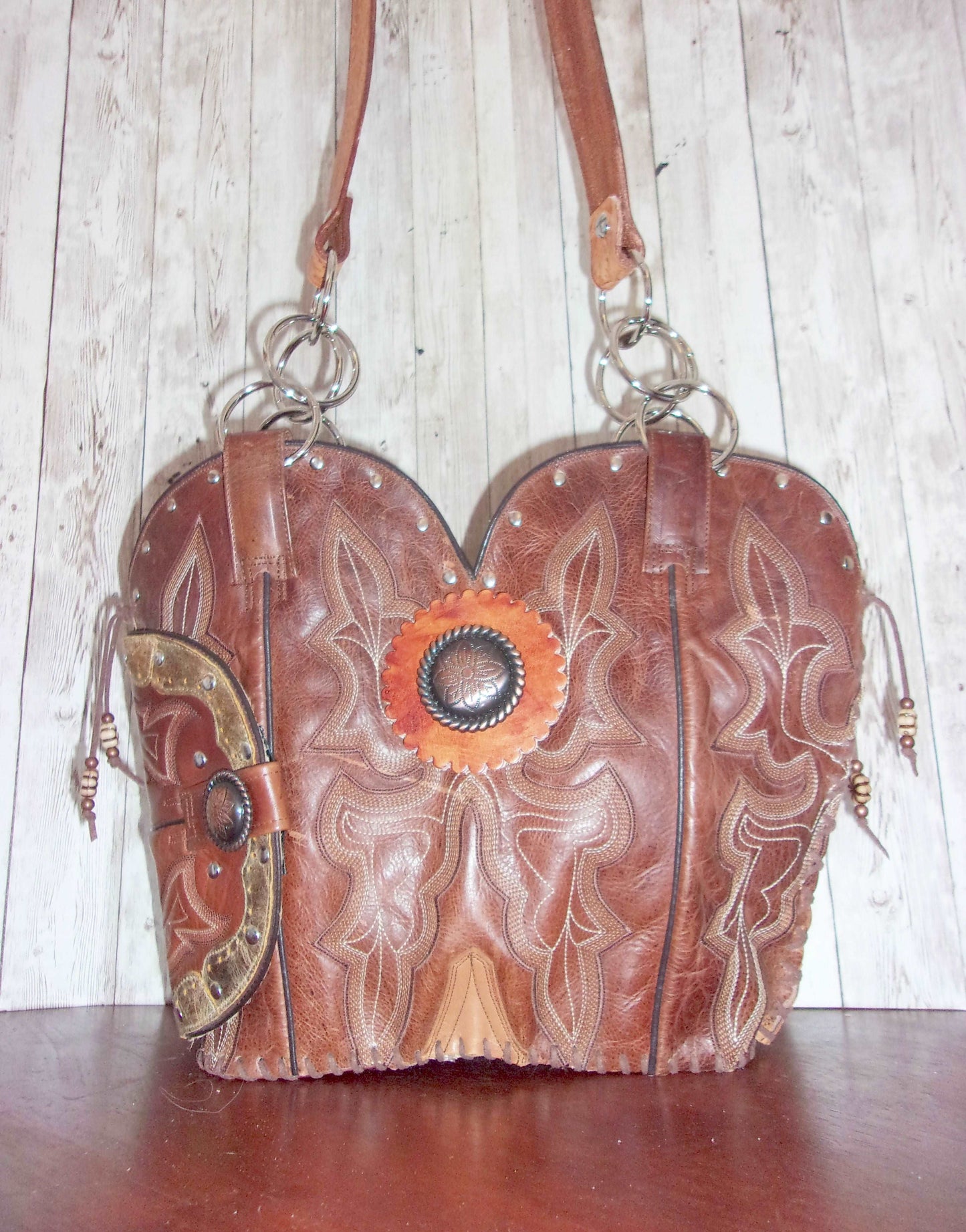 Concealed Carry Cowboy Boot Purse CB63 handcrafted from cowboy boots. Shop Handbags at ChrisThompsonBags.com and buy the best 2nd amendment, conceal carry purse, concealed carry, concealed for her, concealedcarry purse, cowboy boot purse, cowgirl concealed, handgun bag, leather conceal bag, unique concealed, western conceal, western concealed at Chris Thompson Bags.