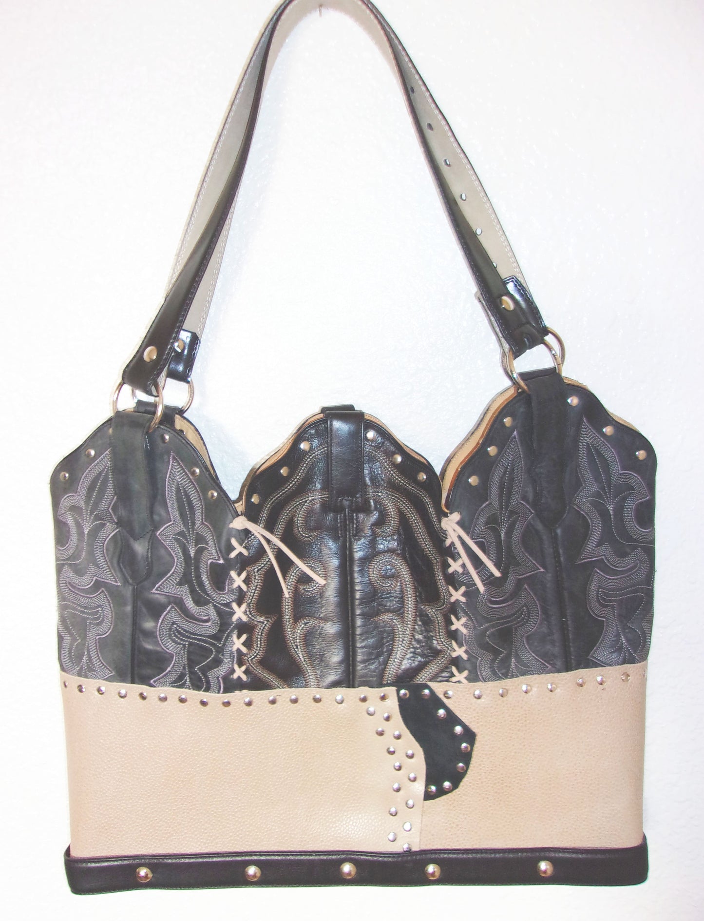 Cowboy Boot Laptop Tote LT29 handcrafted from cowboy boots. Shop Handbags at ChrisThompsonBags.com and buy the best boot purse, cowboy boot purse, cowgirl handbag, leather laptop tote, recycled cowboy boots, unique gift for her, unique gift for him, unique travel bag, western diaper bag, western laptop tote, western travel bag, XL cowboy Boot Purse, XL leather tote at Chris Thompson Bags.