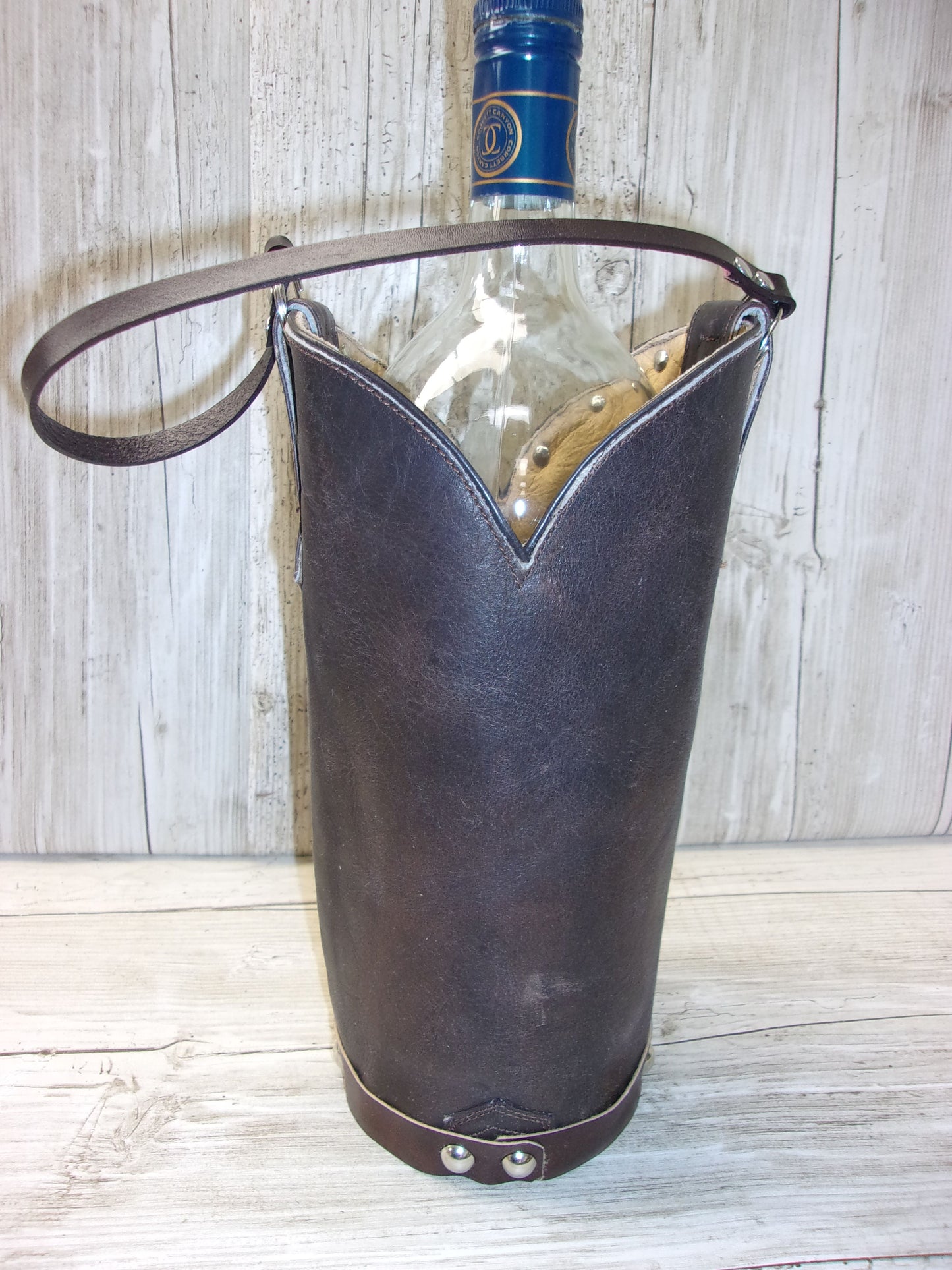 Cowboy Boot Wine Tote wt782 handcrafted from cowboy boots. Shop Wine Carrier Bags at ChrisThompsonBags.com and buy the best country bridesmaid, country centerpiece, country wedding, cowboy gift, cowgirl centerpiece, cowgirl gift, cowgirl wine bag, rodeo party bag, rustic wine carrier, unique western gift, western wine tote, wine lovers gift at Chris Thompson Bags.