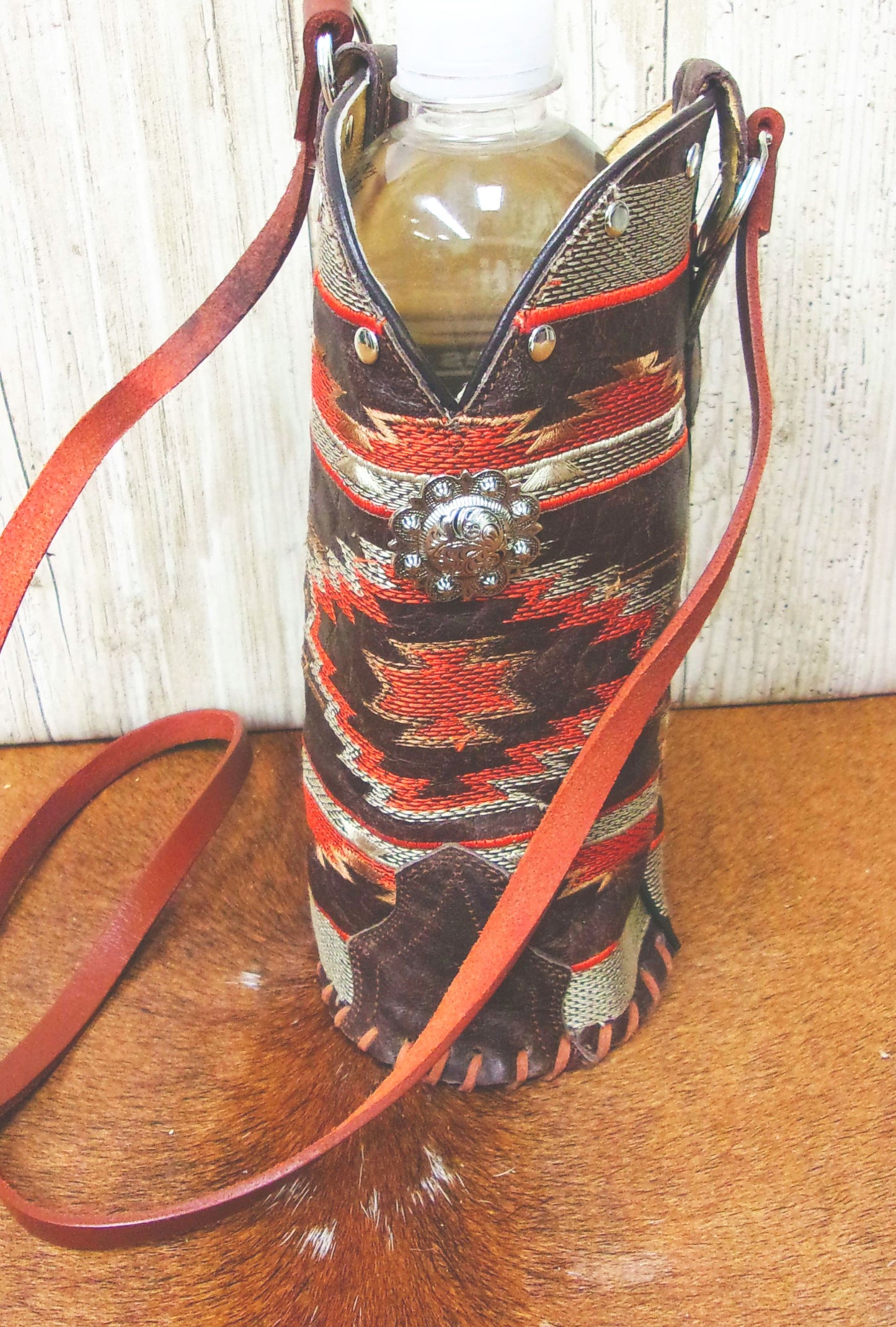 Cowboy Boot Wine Water Tote WA30 handcrafted from cowboy boots. Shop Wine Carrier Bags at ChrisThompsonBags.com and buy the best cowgirl wine tote, leather wine carrier, Leather Wine tote, recycled cowboy boots, unique gift for her, unique gift for him, water bottle caddy, water bottle holder, water bottle tote, western wine carrier, western wine tote, wine lovers gift, Wine Tote at Chris Thompson Bags.