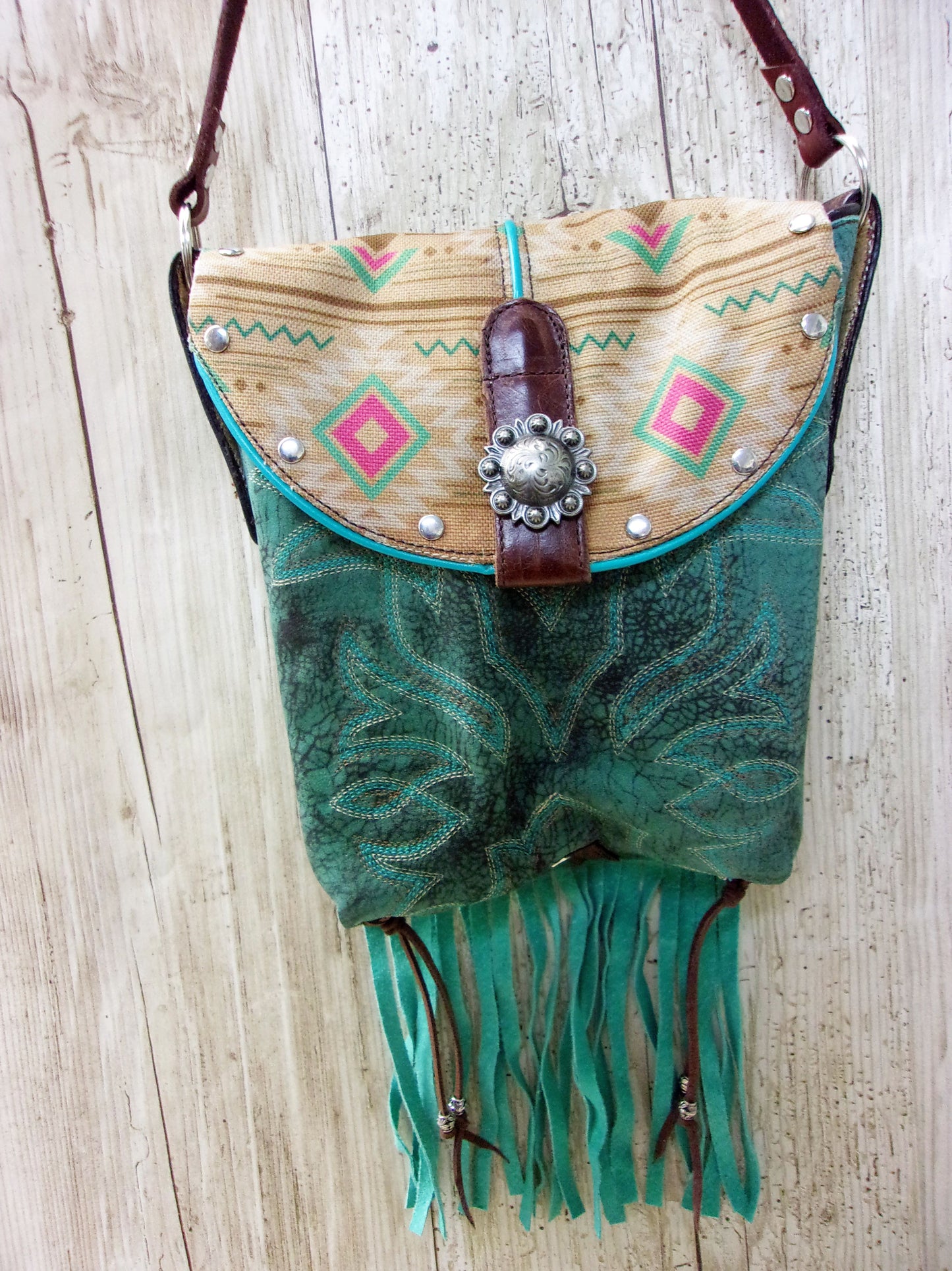 Small Cowboy Boot Purse with Fringe sm213 handcrafted from cowboy boots. Shop all unique leather western handbags, purses and totes at Chris Thompson Bags