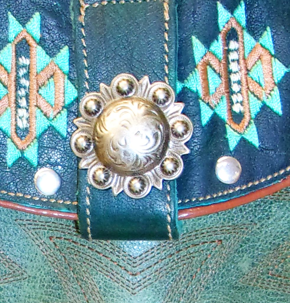 Small Cowboy Boot Purse with Fringe sm220 handcrafted from cowboy boots. Shop all unique leather western handbags, purses and totes at Chris Thompson Bags