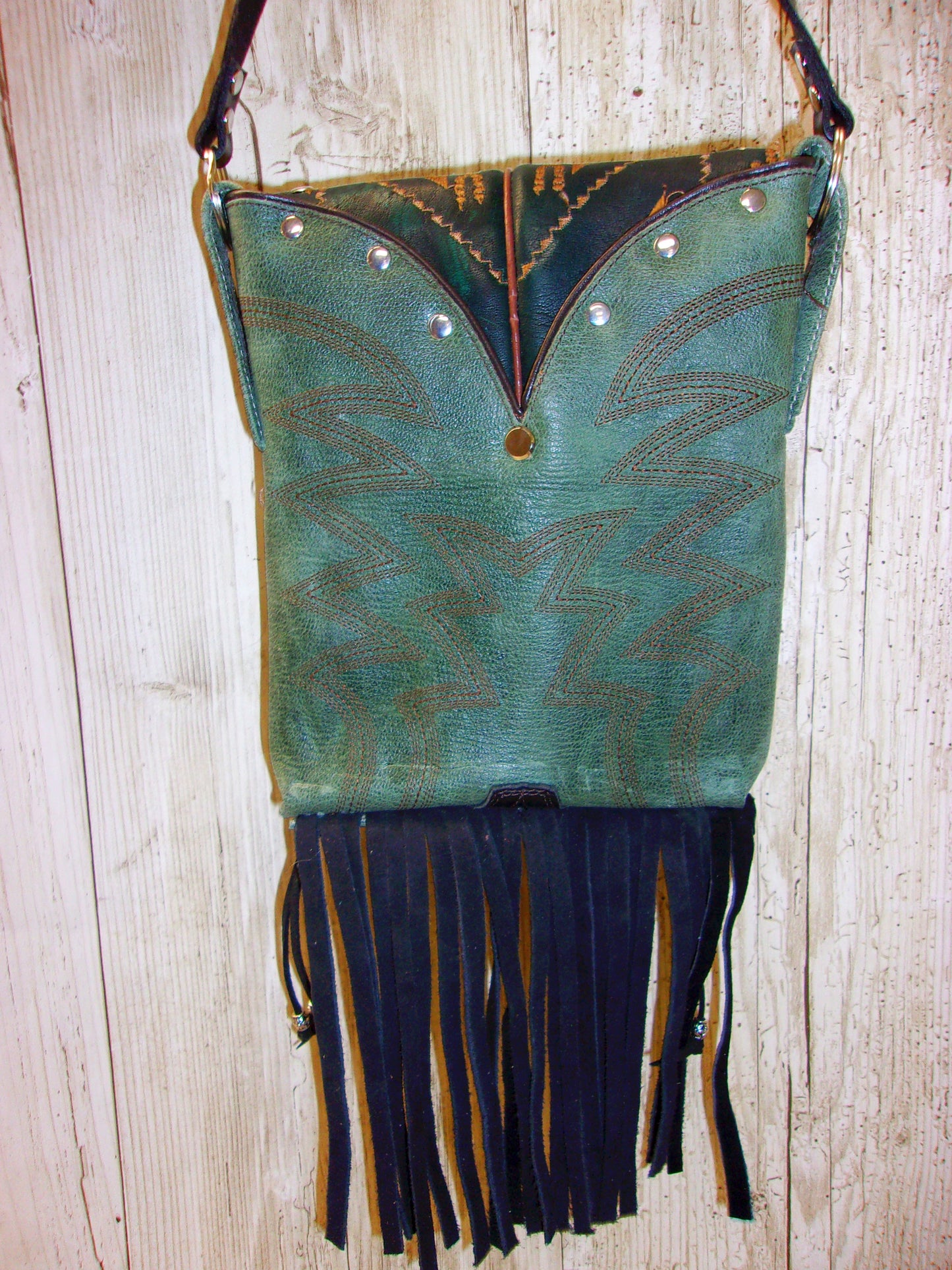 Small Cowboy Boot Purse with Fringe sm220 handcrafted from cowboy boots. Shop all unique leather western handbags, purses and totes at Chris Thompson Bags