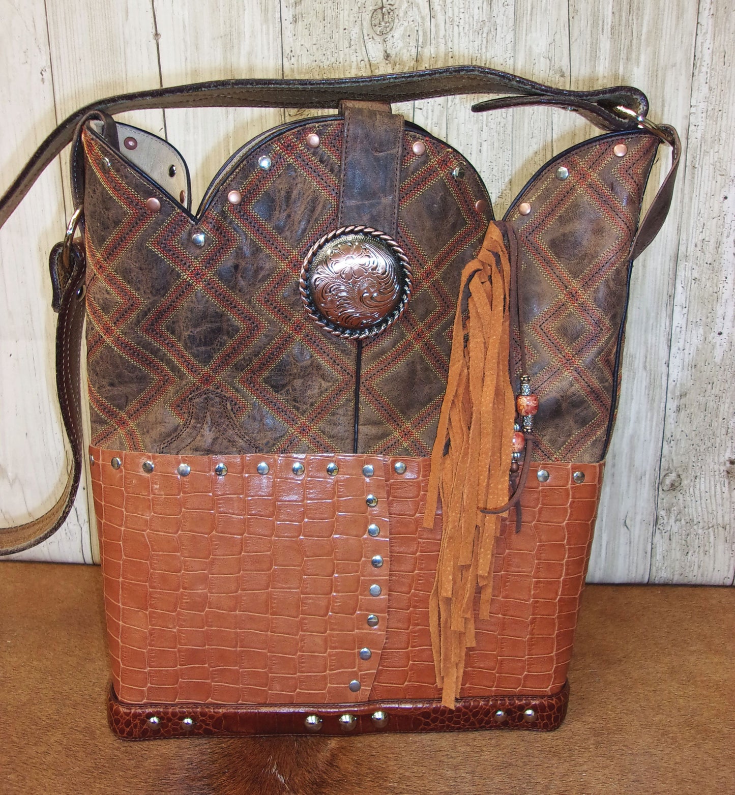 Top Shelf Cowboy Boot Purse with Fringe TS303 handcrafted from cowboy boots. Shop Handbags at ChrisThompsonBags.com and buy the best boot top purse, Country Chic, country fashion, country style, cowboy boot lover, cowboy boot purse, Cowgirl Chic, cowgirl style, luxury handbag, rodeo purse, western chic, western fashion, western style at Chris Thompson Bags.