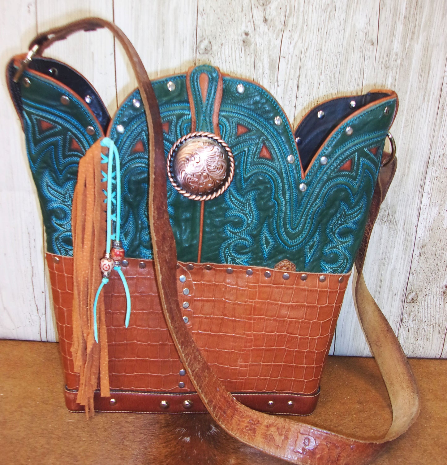 Top Shelf Cowboy Boot Purse with Fringe TS308 handcrafted from cowboy boots. Shop Handbags at ChrisThompsonBags.com and buy the best boot top purse, Country Chic, country fashion, country style, cowboy boot lover, cowboy boot purse, Cowgirl Chic, cowgirl style, luxury handbag, rodeo purse, western chic, western fashion, western style at Chris Thompson Bags.