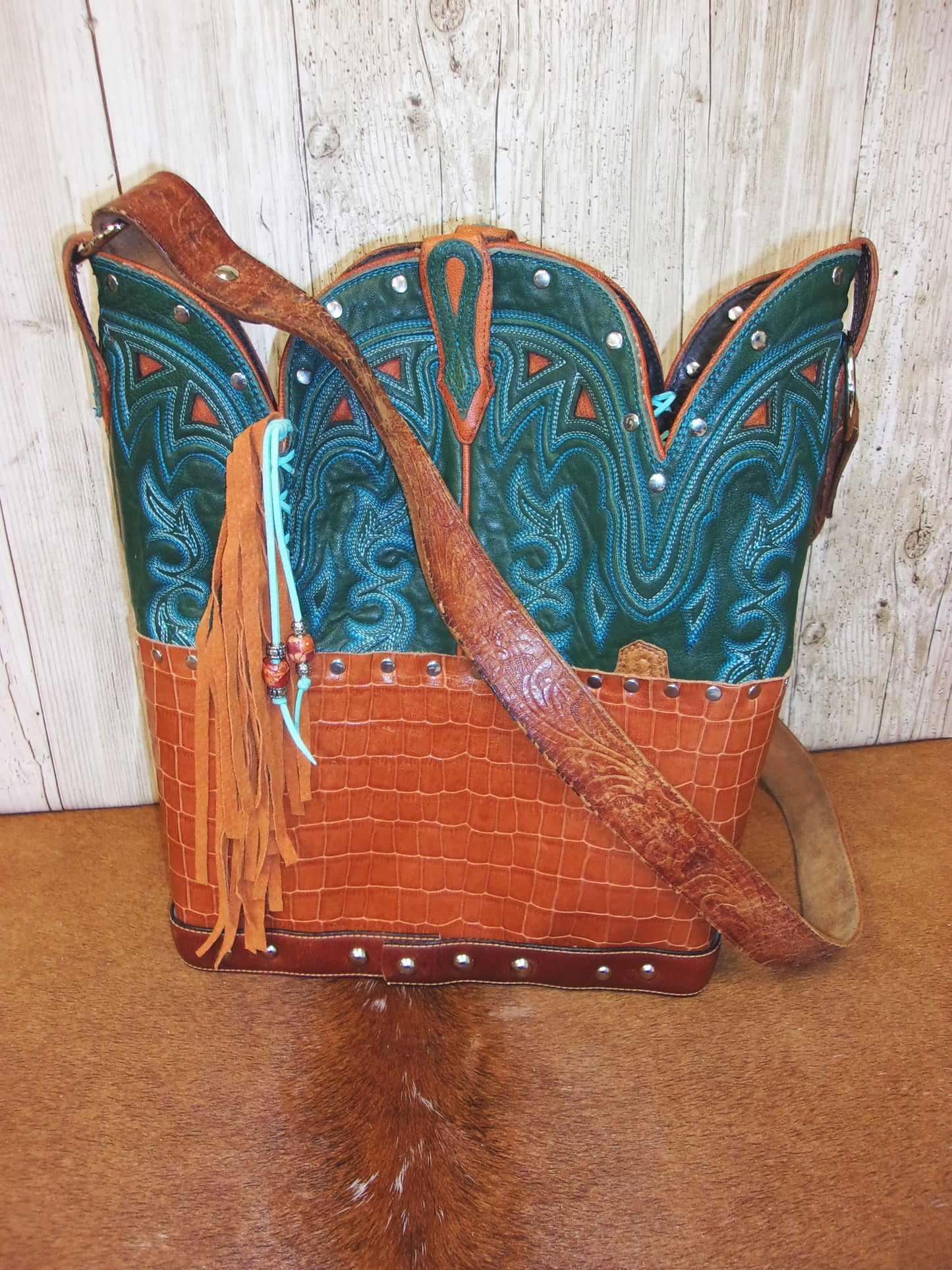 Top Shelf Cowboy Boot Purse with Fringe TS308 handcrafted from cowboy boots. Shop Handbags at ChrisThompsonBags.com and buy the best boot top purse, Country Chic, country fashion, country style, cowboy boot lover, cowboy boot purse, Cowgirl Chic, cowgirl style, luxury handbag, rodeo purse, western chic, western fashion, western style at Chris Thompson Bags.