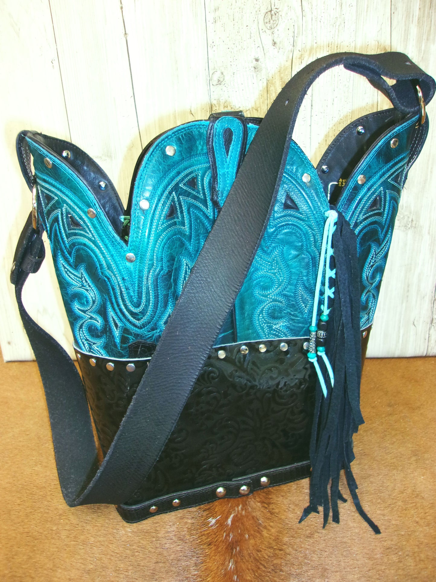 Top Shelf Cowboy Boot Purse with Fringe TS312 handcrafted from cowboy boots. Shop Handbags at ChrisThompsonBags.com and buy the best boot top purse, Country Chic, country fashion, country style, cowboy boot lover, cowboy boot purse, Cowgirl Chic, cowgirl style, luxury handbag, rodeo purse, western chic, western fashion, western style at Chris Thompson Bags.