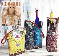 cowboy boot wine and whiskey totes from chris thompson bags featured in cowgirl magazine