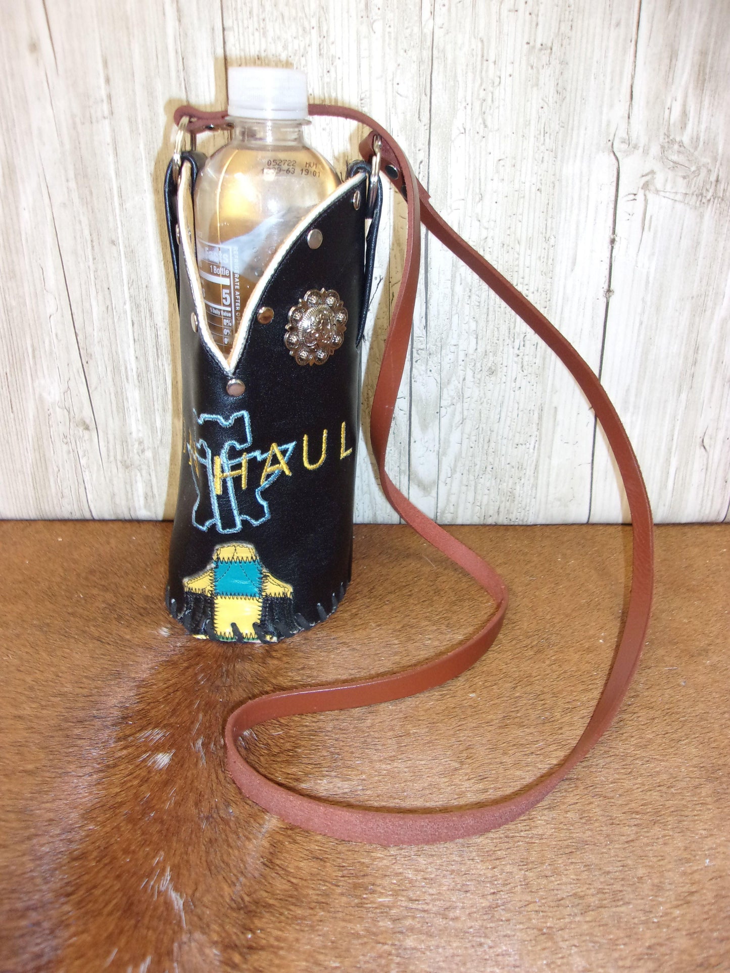 Cowboy Boot Wine Water Tote WA21 handcrafted from cowboy boots. Shop Wine Carrier Bags at ChrisThompsonBags.com and buy the best cowgirl wine tote, leather wine carrier, Leather Wine tote, recycled cowboy boots, unique gift for her, unique gift for him, water bottle caddy, water bottle holder, water bottle tote, western wine carrier, western wine tote, wine lovers gift, Wine Tote at Chris Thompson Bags.