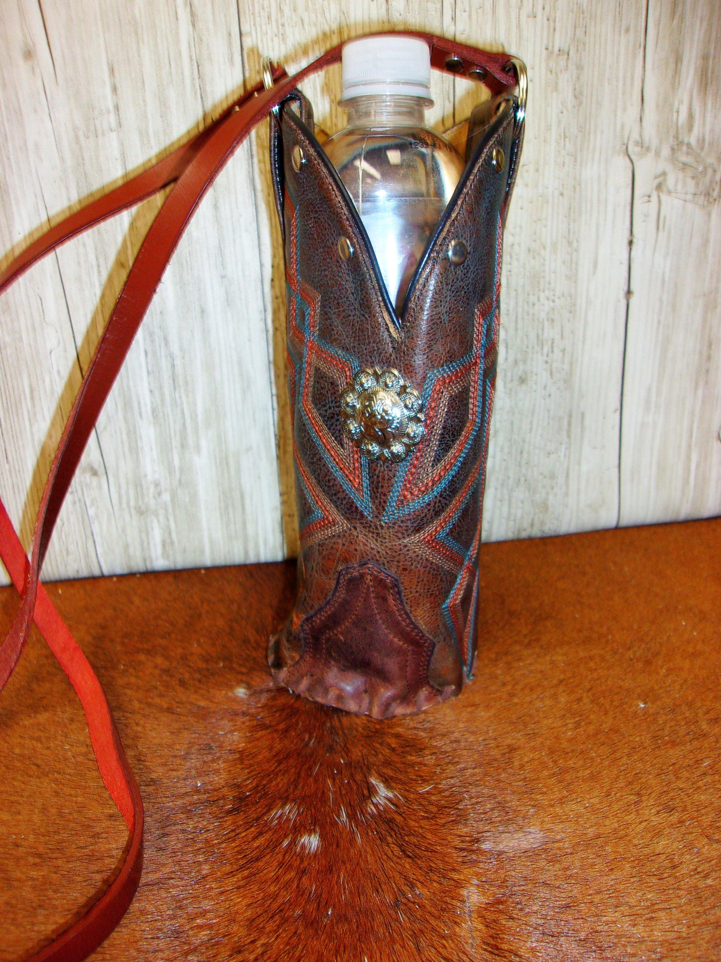 Cowboy Boot Wine Water Tote WA38 handcrafted from cowboy boots. Shop Wine Carrier Bags at ChrisThompsonBags.com and buy the best cowgirl wine tote, leather wine carrier, Leather Wine tote, recycled cowboy boots, unique gift for her, unique gift for him, water bottle caddy, water bottle holder, water bottle tote, western wine carrier, western wine tote, wine lovers gift, Wine Tote at Chris Thompson Bags.