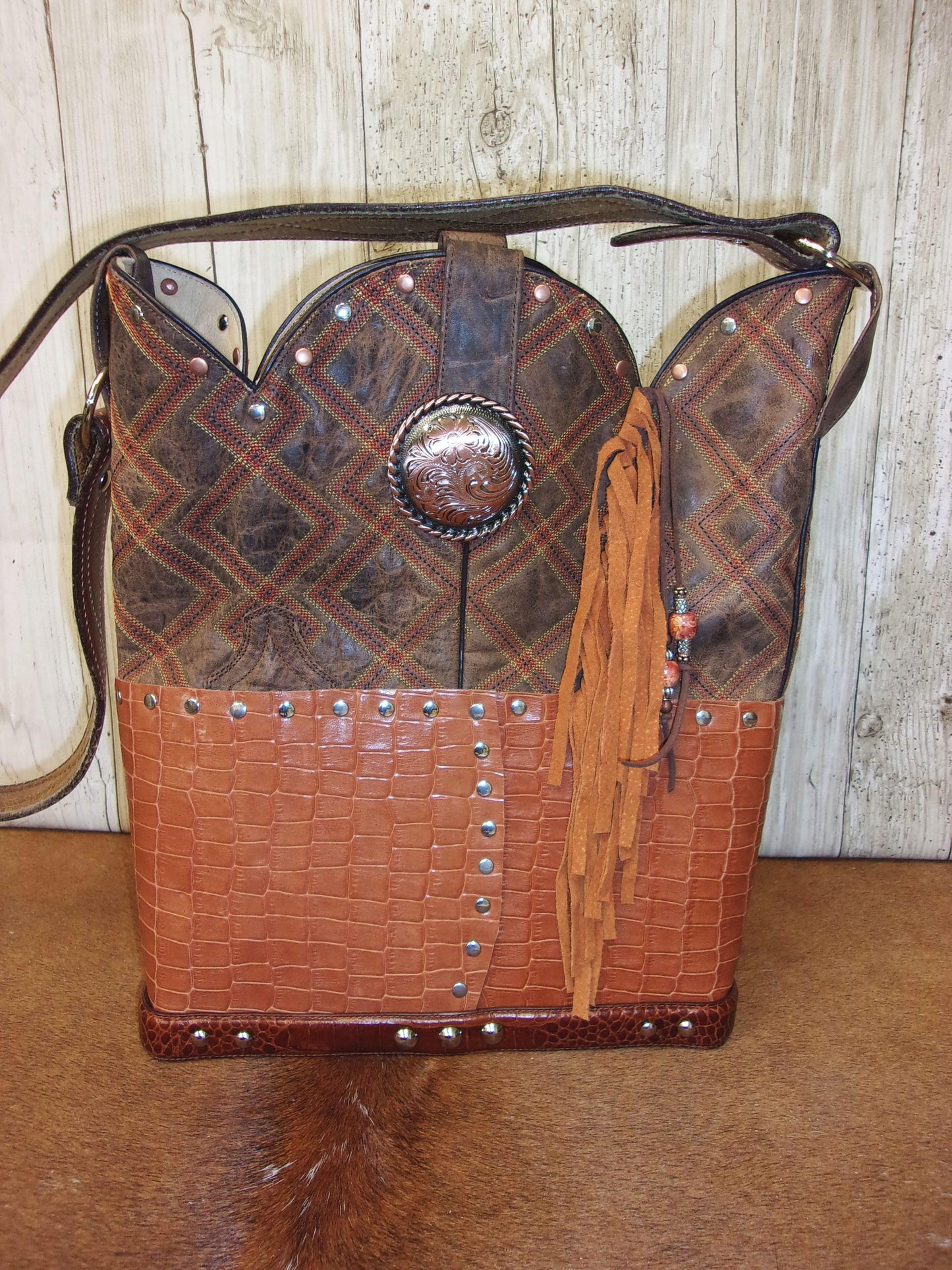 Top Shelf Cowboy Boot Purse with Fringe TS303 handcrafted from cowboy boots. Shop Handbags at ChrisThompsonBags.com and buy the best boot top purse, Country Chic, country fashion, country style, cowboy boot lover, cowboy boot purse, Cowgirl Chic, cowgirl style, luxury handbag, rodeo purse, western chic, western fashion, western style at Chris Thompson Bags.