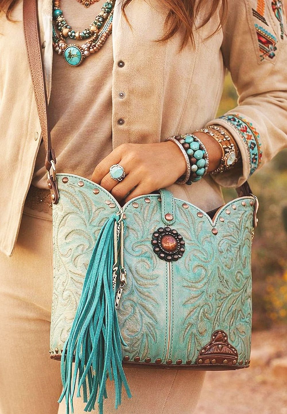 cowboy boot purse with fringe on model