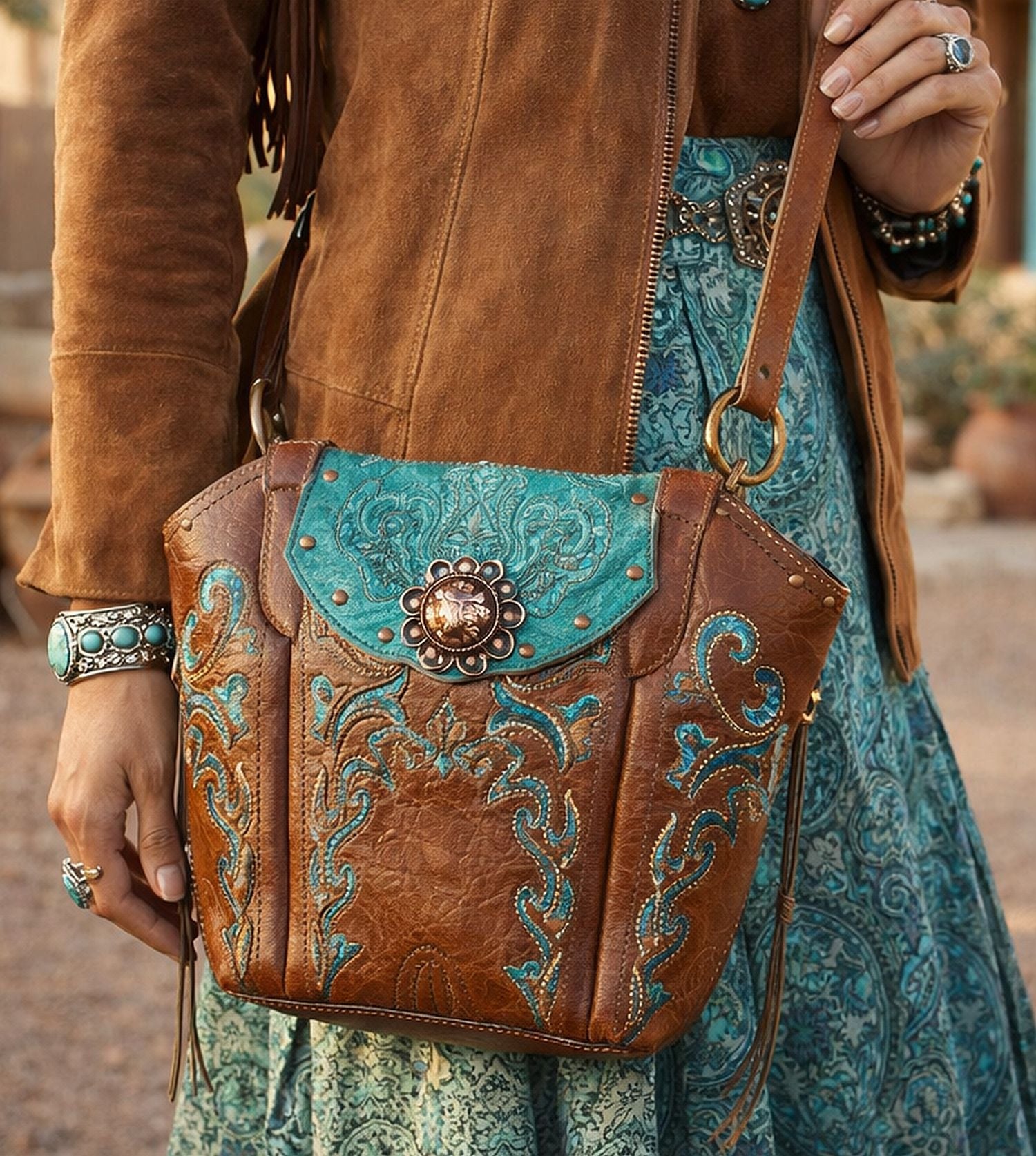 woman wearing turquoise and brown leather purse