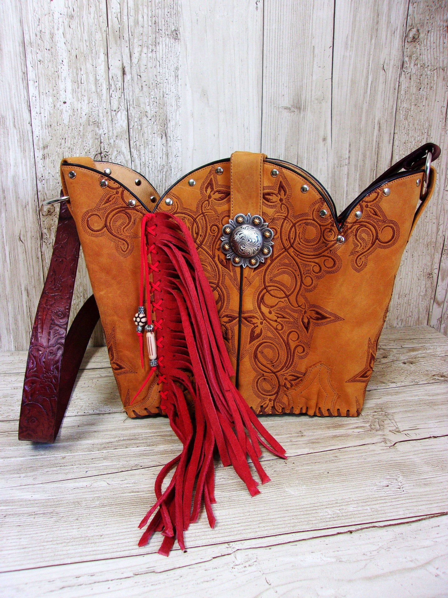 Bucket Bag Cowboy Boot Fringe Purse BK61 handcrafted from cowboy boots. Shop all unique leather western handbags, purses and totes at Chris Thompson Bags