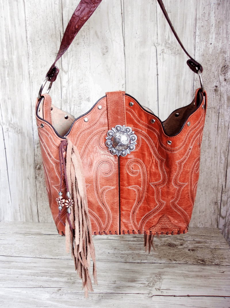 Bucket Bag Cowboy Boot Fringe Purse BK81 handcrafted from cowboy boots. Shop all unique leather western handbags, purses and totes at Chris Thompson Bags