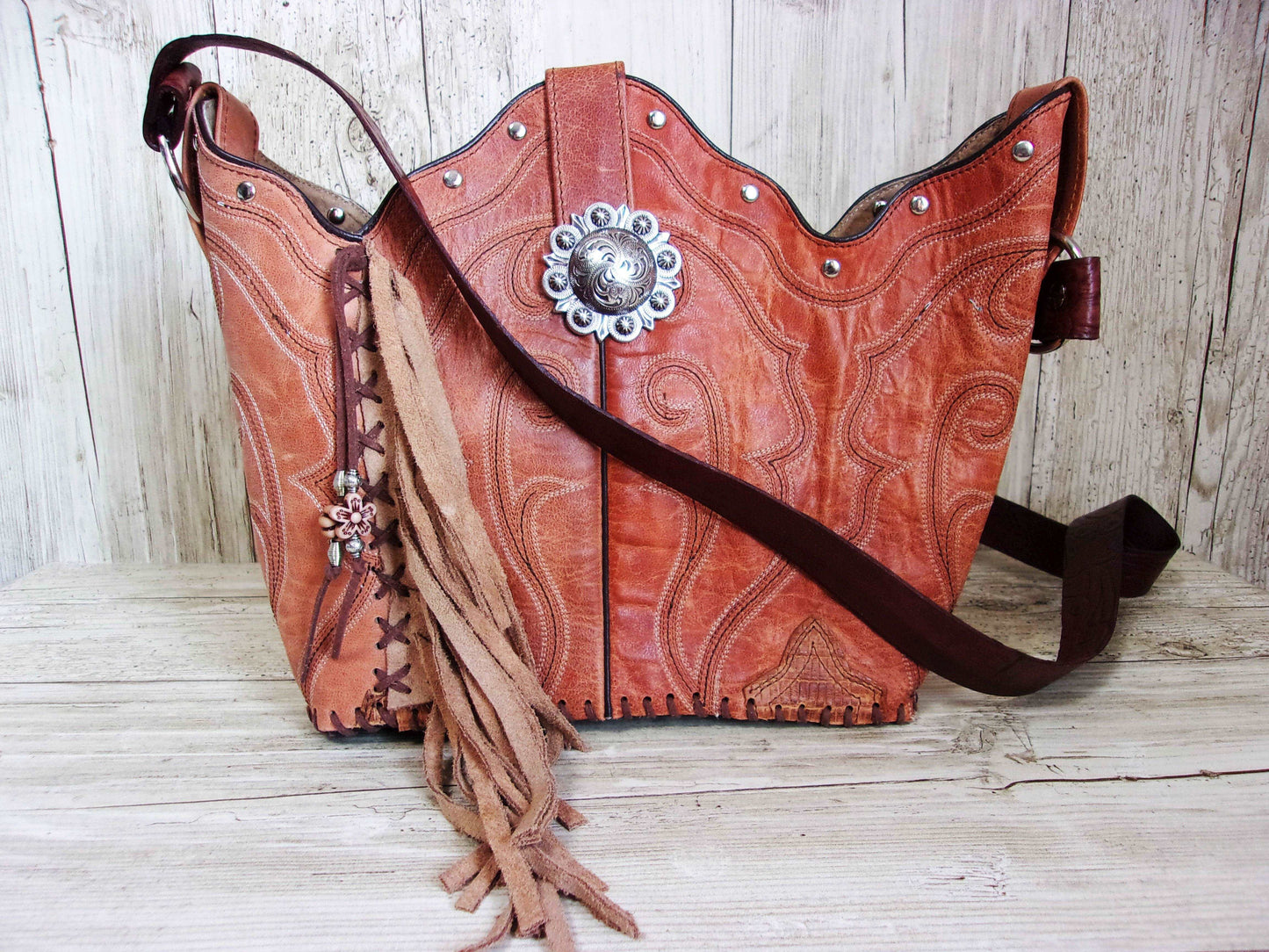 Bucket Bag Cowboy Boot Fringe Purse BK81 handcrafted from cowboy boots. Shop all unique leather western handbags, purses and totes at Chris Thompson Bags