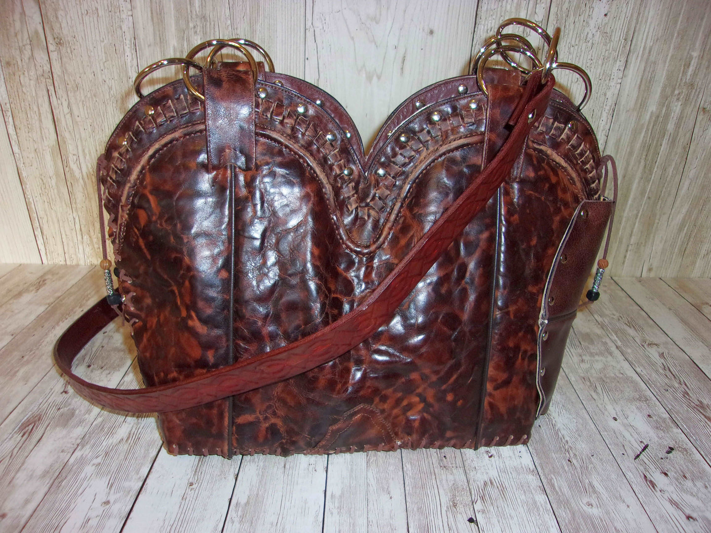 Concealed Carry Cowboy Boot Purse CB121 handcrafted from cowboy boots. Shop Handbags at ChrisThompsonBags.com and buy the best 2nd amendment, conceal carry purse, concealed carry, concealed for her, concealedcarry purse, cowboy boot purse, cowgirl concealed, handgun bag, leather conceal bag, unique concealed, western conceal, western concealed at Chris Thompson Bags.