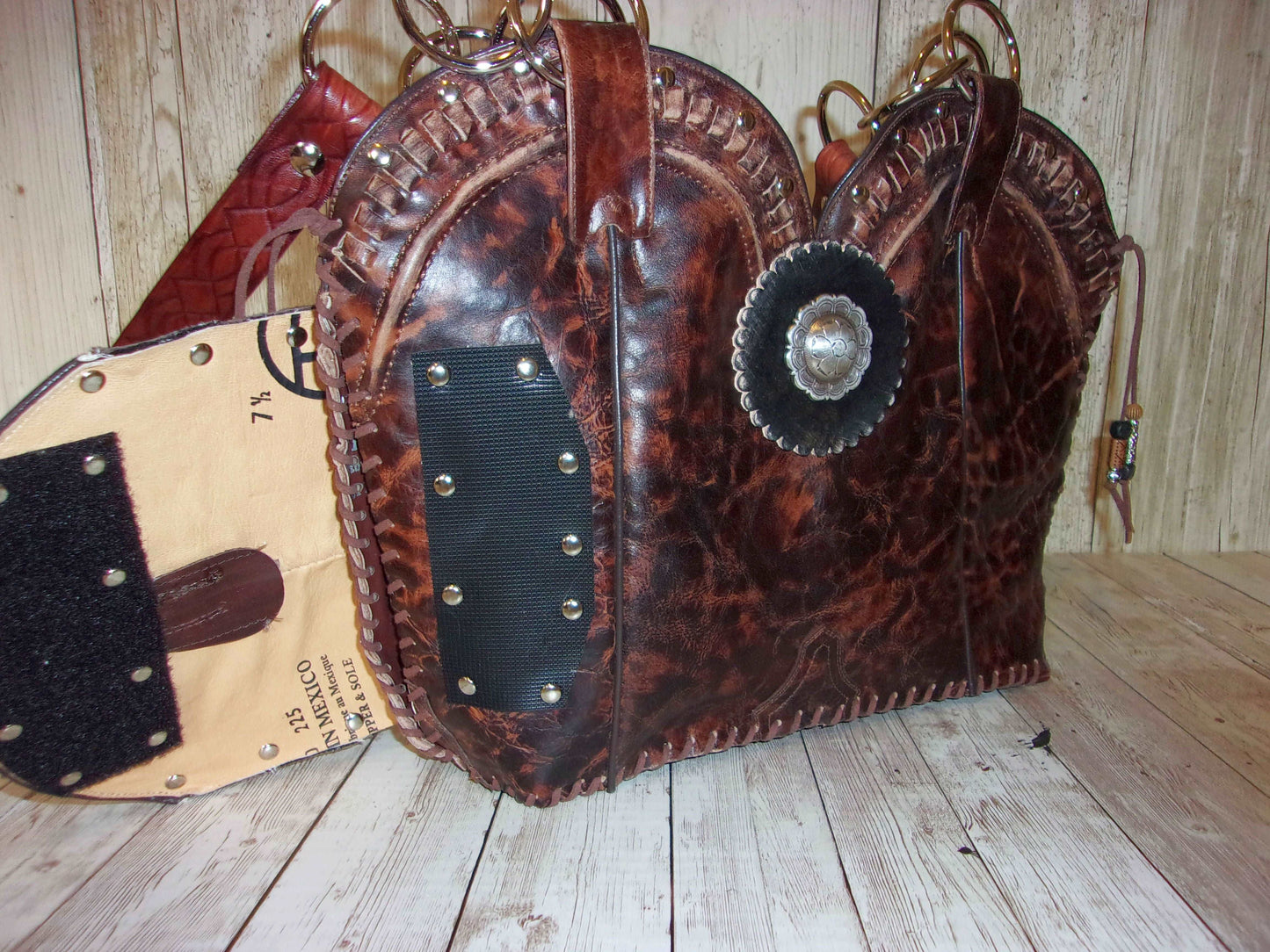 Concealed Carry Cowboy Boot Purse CB121 handcrafted from cowboy boots. Shop Handbags at ChrisThompsonBags.com and buy the best 2nd amendment, conceal carry purse, concealed carry, concealed for her, concealedcarry purse, cowboy boot purse, cowgirl concealed, handgun bag, leather conceal bag, unique concealed, western conceal, western concealed at Chris Thompson Bags.