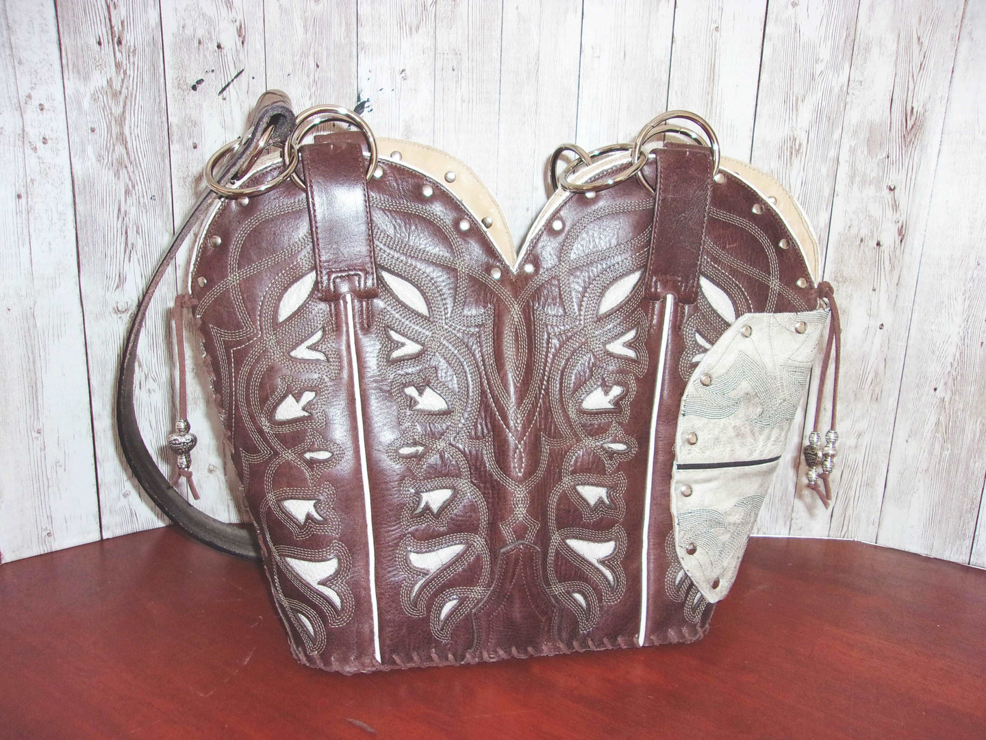 Concealed Carry Cowboy Boot Purse CB60 handcrafted from cowboy boots. Shop Handbags at ChrisThompsonBags.com and buy the best 2nd amendment, conceal carry purse, concealed carry, concealed for her, concealedcarry purse, cowboy boot purse, cowgirl concealed, handgun bag, leather conceal bag, unique concealed, western conceal, western concealed at Chris Thompson Bags.