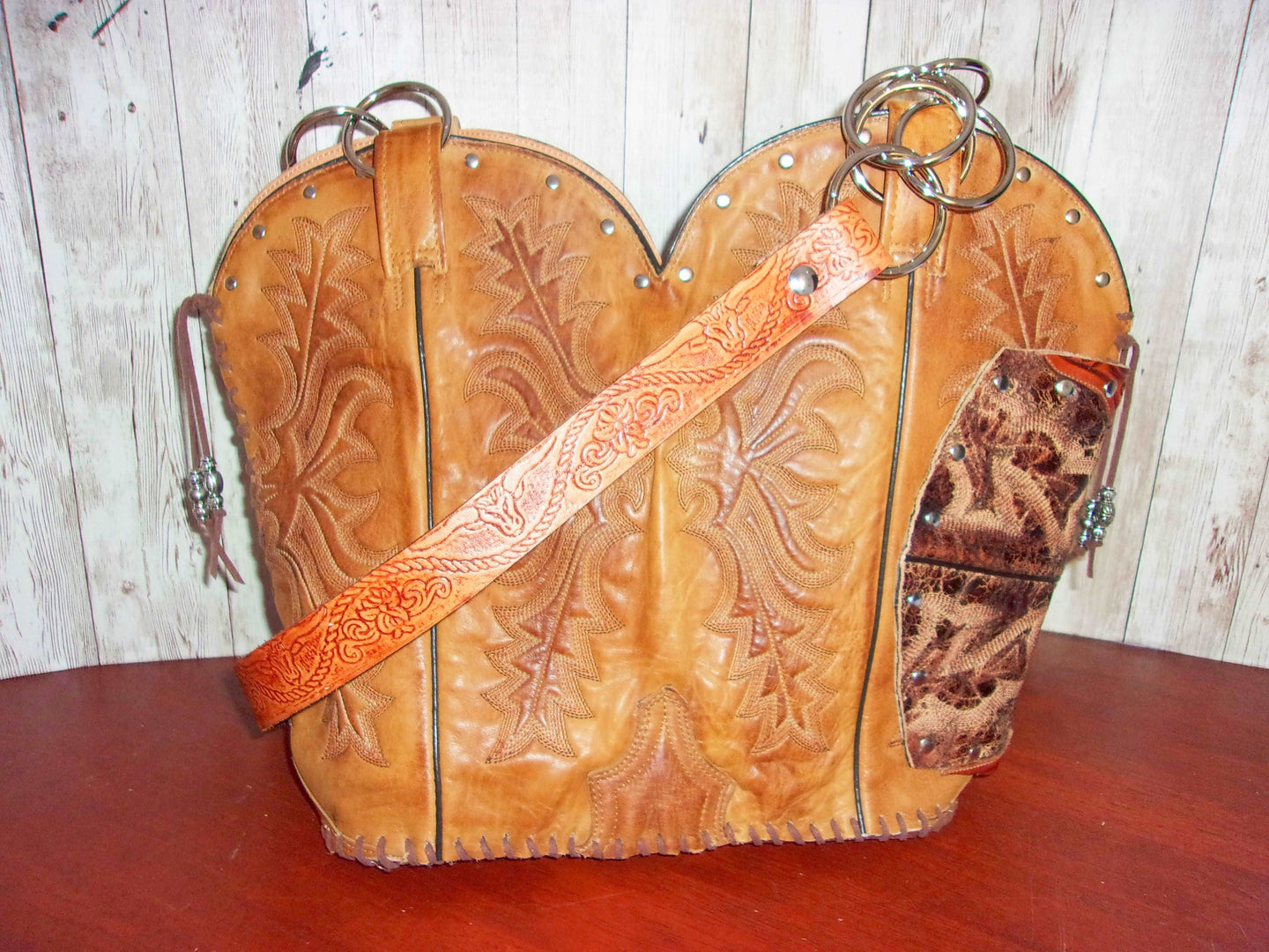 Concealed Carry Cowboy Boot Purse CB68 handcrafted from cowboy boots. Shop Handbags at ChrisThompsonBags.com and buy the best 2nd amendment, conceal carry purse, concealed carry, concealed for her, concealedcarry purse, cowboy boot purse, cowgirl concealed, handgun bag, leather conceal bag, unique concealed, western conceal, western concealed at Chris Thompson Bags.