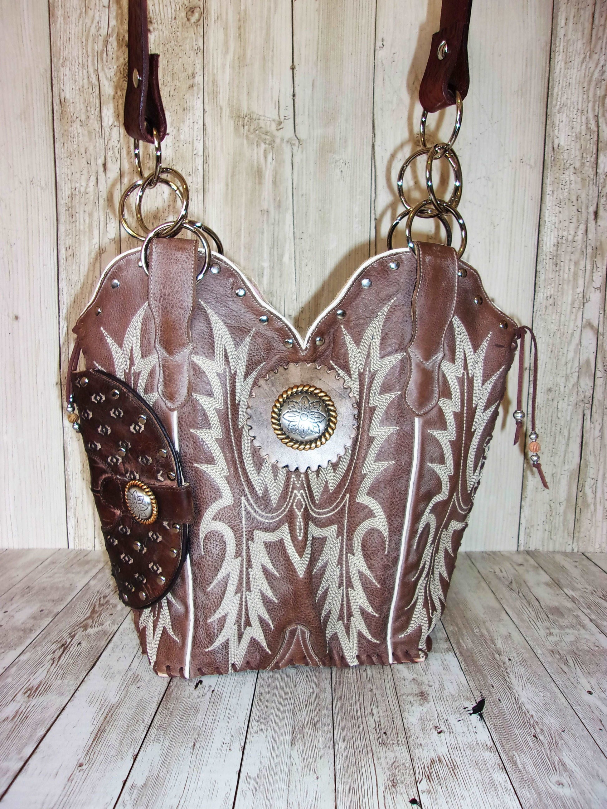 Concealed Carry Cowboy Boot Purse CB81 handcrafted from cowboy boots. Shop Handbags at and buy the best 2nd amendment, conceal carry purse, concealed carry, concealed for her, concealedcarry purse, cowboy boot purse, cowgirl concealed, handgun bag, leather conceal bag, unique concealed, western conceal, western concealed at Chris Thompson Bags.