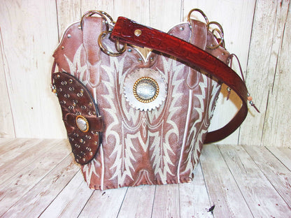 Concealed Carry Cowboy Boot Purse CB81 handcrafted from cowboy boots. Shop Handbags at and buy the best 2nd amendment, conceal carry purse, concealed carry, concealed for her, concealedcarry purse, cowboy boot purse, cowgirl concealed, handgun bag, leather conceal bag, unique concealed, western conceal, western concealed at Chris Thompson Bags.