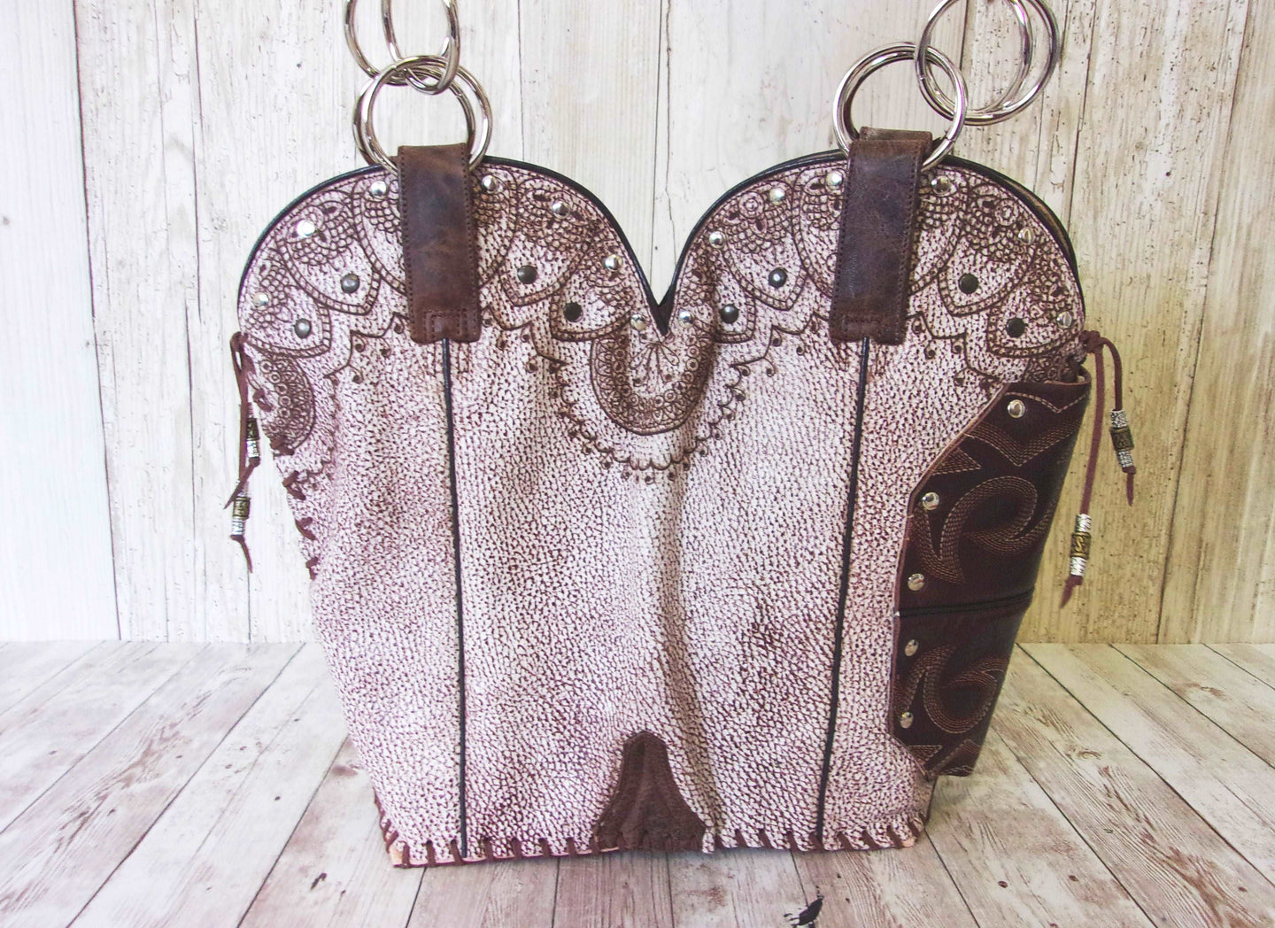 Concealed Carry Cowboy Boot Purse CB84 handcrafted from cowboy boots. Shop Handbags at ChrisThompsonBags.com and buy the best 2nd amendment, conceal carry purse, concealed carry, concealed for her, concealedcarry purse, cowboy boot purse, cowgirl concealed, handgun bag, leather conceal bag, unique concealed, western conceal, western concealed at Chris Thompson Bags.