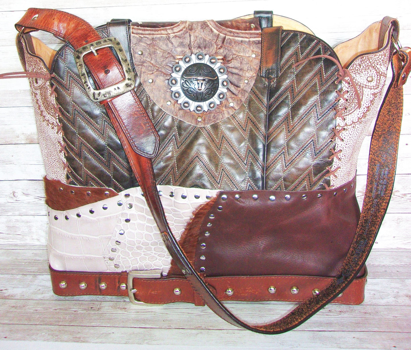 Cowboy Boot Laptop Tote LT36 handcrafted from cowboy boots. Shop Handbags at ChrisThompsonBags.com and buy the best boot purse, cowboy boot purse, cowgirl handbag, leather laptop tote, recycled cowboy boots, unique gift for her, unique gift for him, unique travel bag, western diaper bag, western laptop tote, western travel bag, XL cowboy Boot Purse, XL leather tote at Chris Thompson Bags.