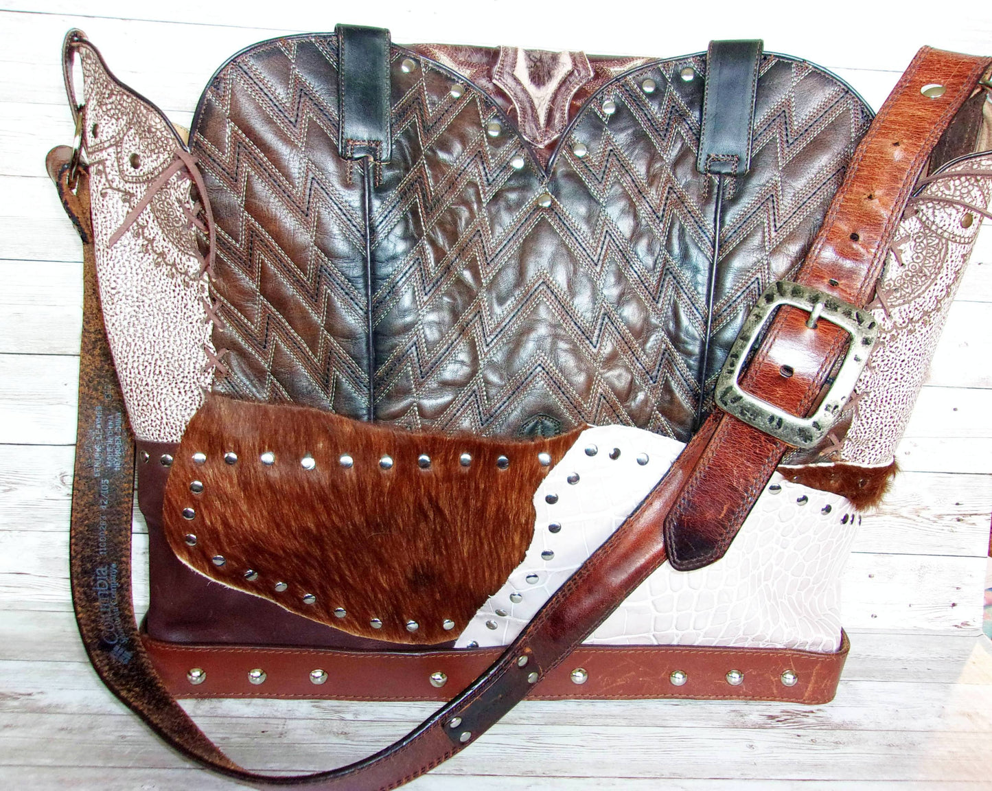 Cowboy Boot Laptop Tote LT36 handcrafted from cowboy boots. Shop Handbags at ChrisThompsonBags.com and buy the best boot purse, cowboy boot purse, cowgirl handbag, leather laptop tote, recycled cowboy boots, unique gift for her, unique gift for him, unique travel bag, western diaper bag, western laptop tote, western travel bag, XL cowboy Boot Purse, XL leather tote at Chris Thompson Bags.