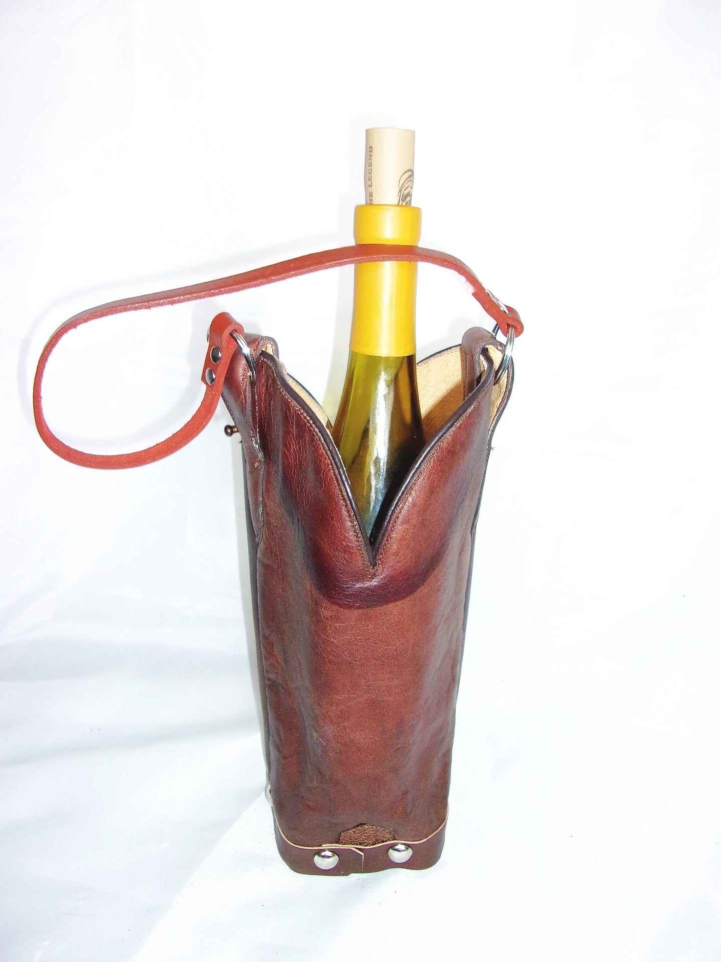 Cowboy Boot Wine Tote wt539 handcrafted from cowboy boots. Shop Wine Carrier Bags at ChrisThompsonBags.com and buy the best country bridesmaid, country centerpiece, country wedding, cowboy gift, cowgirl centerpiece, cowgirl gift, cowgirl wine bag, rodeo party bag, rustic wine carrier, unique western gift, western wine tote, wine lovers gift at Chris Thompson Bags.