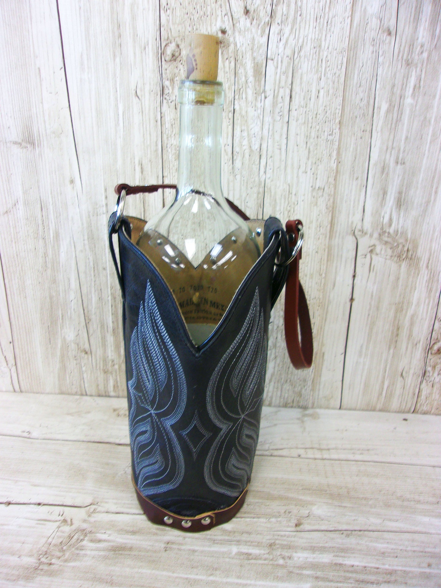 Cowboy Boot Wine Tote wt692 handcrafted from cowboy boots. Shop Wine Carrier Bags at ChrisThompsonBags.com and buy the best country bridesmaid, country centerpiece, country wedding, cowboy gift, cowgirl centerpiece, cowgirl gift, cowgirl wine bag, rodeo party bag, rustic wine carrier, unique western gift, western wine tote, wine lovers gift at Chris Thompson Bags.