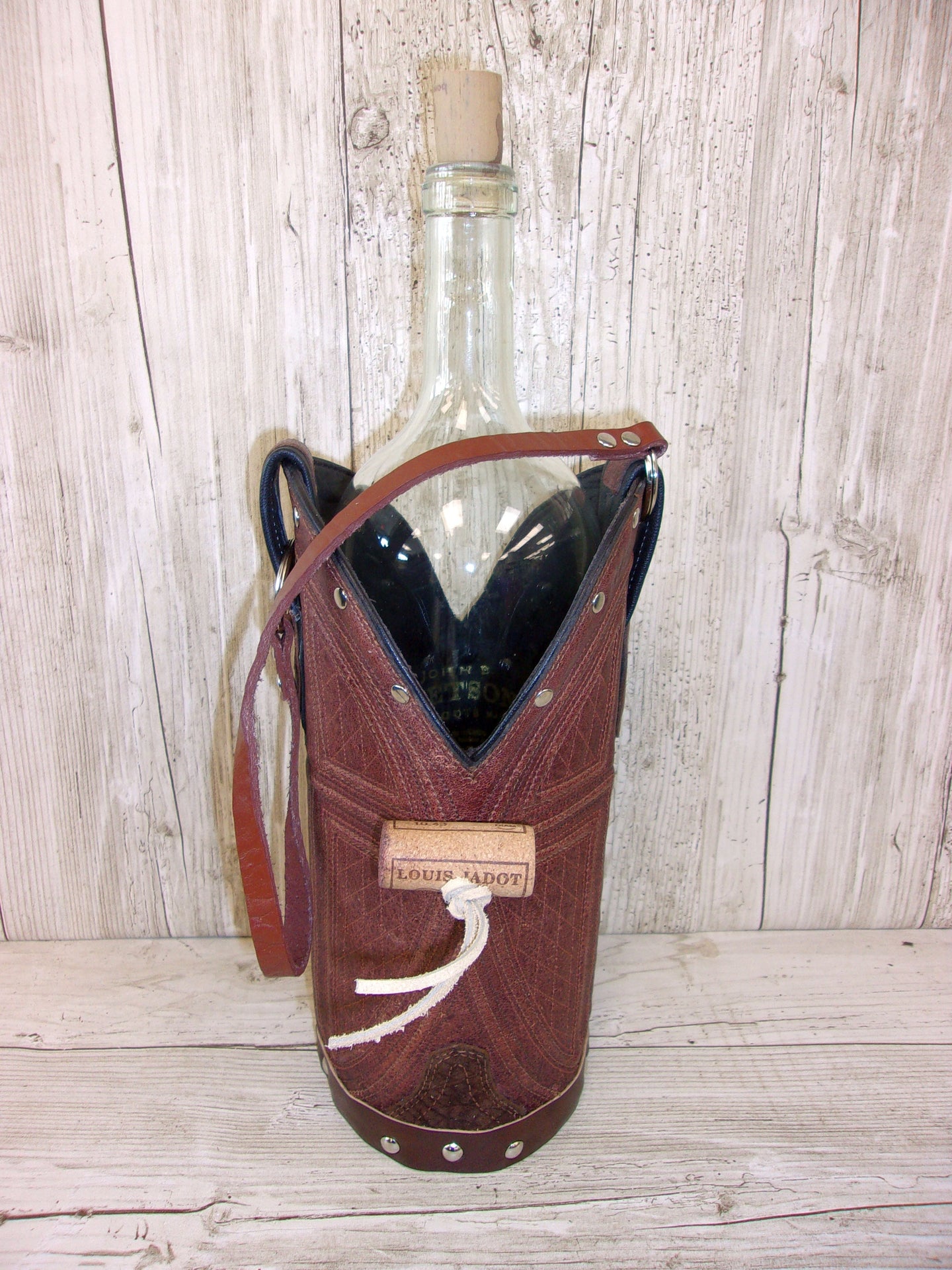 Cowboy Boot Wine Tote wt706 handcrafted from cowboy boots. Shop Wine Carrier Bags at ChrisThompsonBags.com and buy the best country bridesmaid, country centerpiece, country wedding, cowboy gift, cowgirl centerpiece, cowgirl gift, cowgirl wine bag, rodeo party bag, rustic wine carrier, unique western gift, western wine tote, wine lovers gift at Chris Thompson Bags.