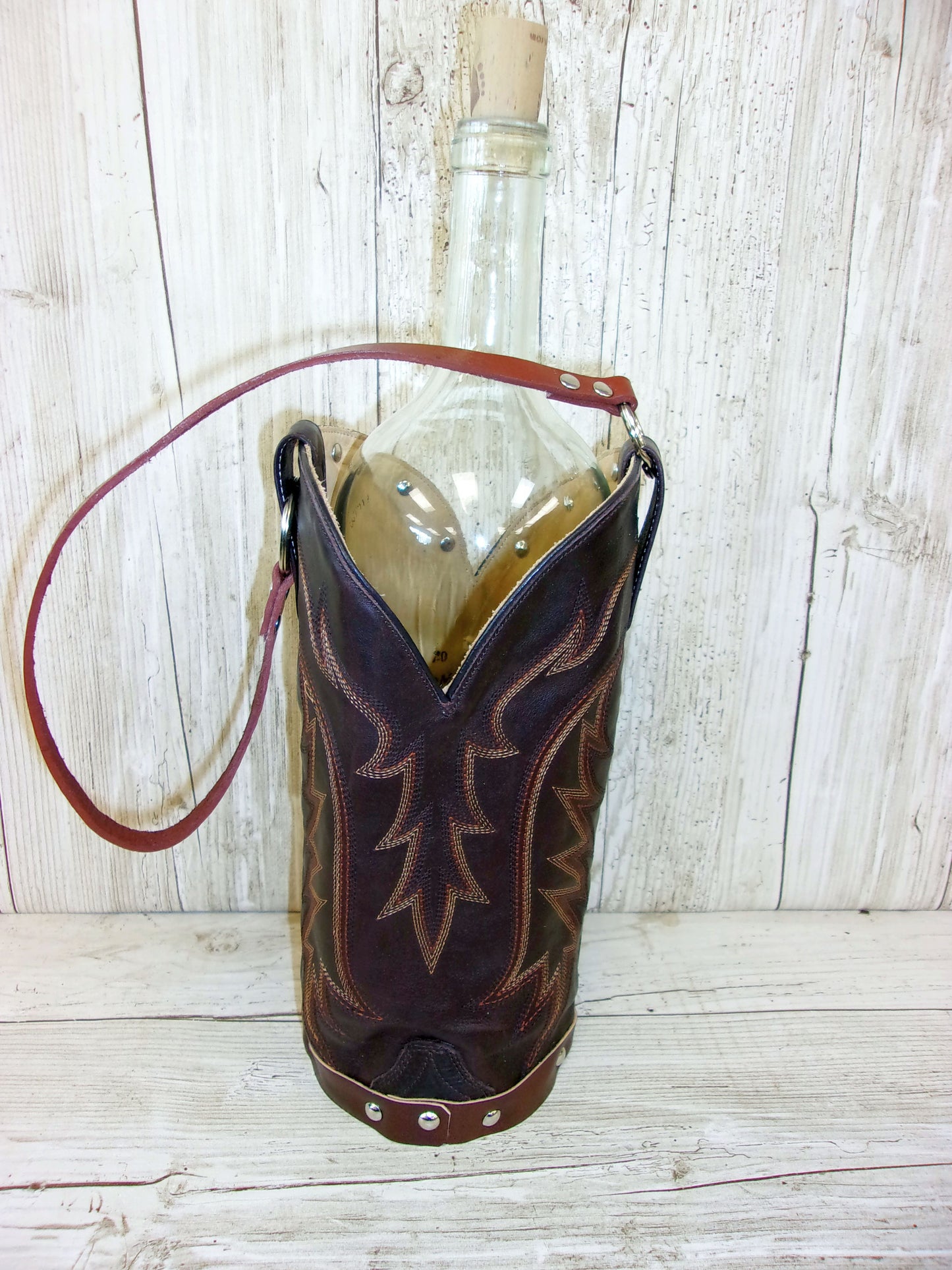 Cowboy Boot Wine Tote wt711 handcrafted from cowboy boots. Shop all unique leather western handbags, purses and totes at Chris Thompson Bags