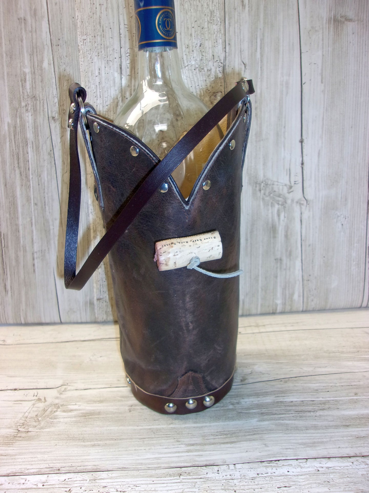 Cowboy Boot Wine Tote wt779 handcrafted from cowboy boots. Shop Wine Carrier Bags at ChrisThompsonBags.com and buy the best country bridesmaid, country centerpiece, country wedding, cowboy gift, cowgirl centerpiece, cowgirl gift, cowgirl wine bag, rodeo party bag, rustic wine carrier, unique western gift, western wine tote, wine lovers gift at Chris Thompson Bags.