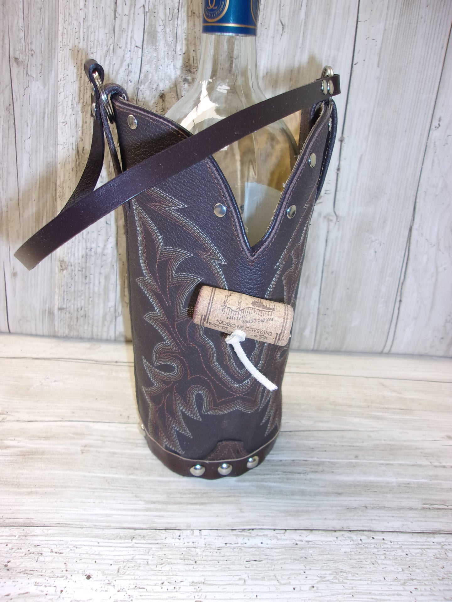 Cowboy Boot Wine Tote wt784 handcrafted from cowboy boots. Shop Wine Carrier Bags at ChrisThompsonBags.com and buy the best country bridesmaid, country centerpiece, country wedding, cowboy gift, cowgirl centerpiece, cowgirl gift, cowgirl wine bag, rodeo party bag, rustic wine carrier, unique western gift, western wine tote, wine lovers gift at Chris Thompson Bags.