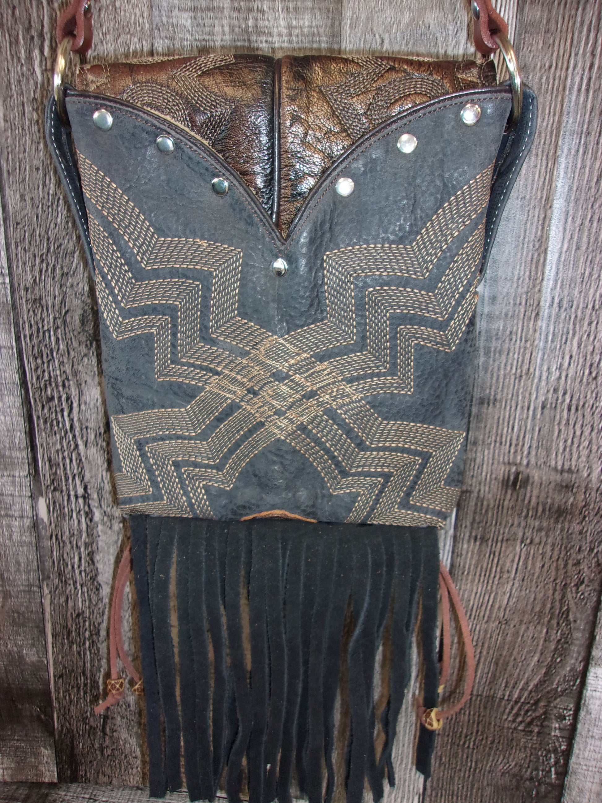 Small Cowboy Boot Purse with Fringe sm150 handcrafted from cowboy boots. Shop all unique leather western handbags, purses and totes at Chris Thompson Bags