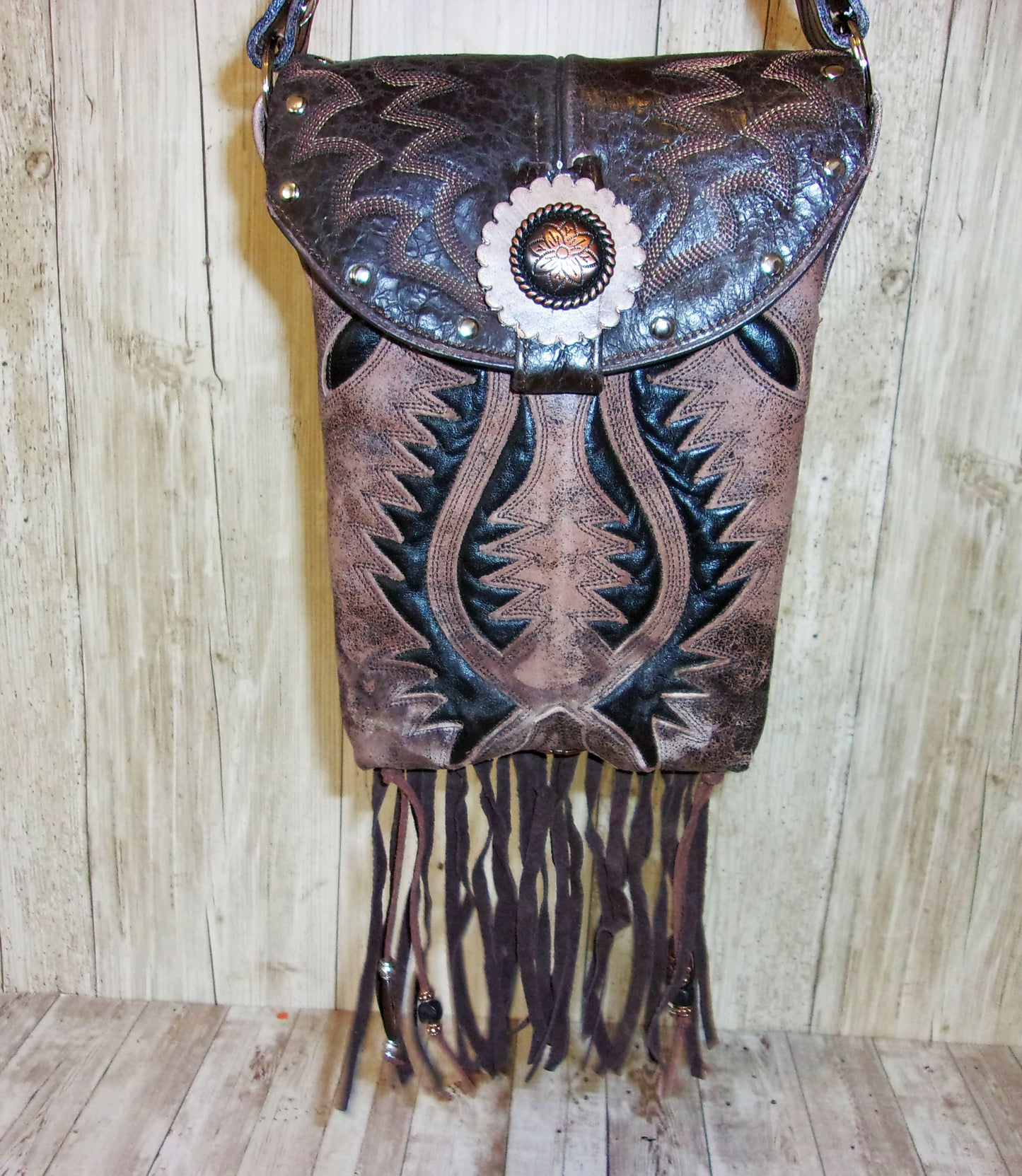 Small Concealed Carry Purse with Fringe CB110 handcrafted from cowboy boots. Shop Handbags at ChrisThompsonBags.com and buy the best 2nd amendment, conceal carry purse, concealed carry, concealed for her, concealedcarry purse, cowboy boot purse, cowgirl concealed, handgun bag, leather conceal bag, unique concealed, western conceal, western concealed at Chris Thompson Bags.