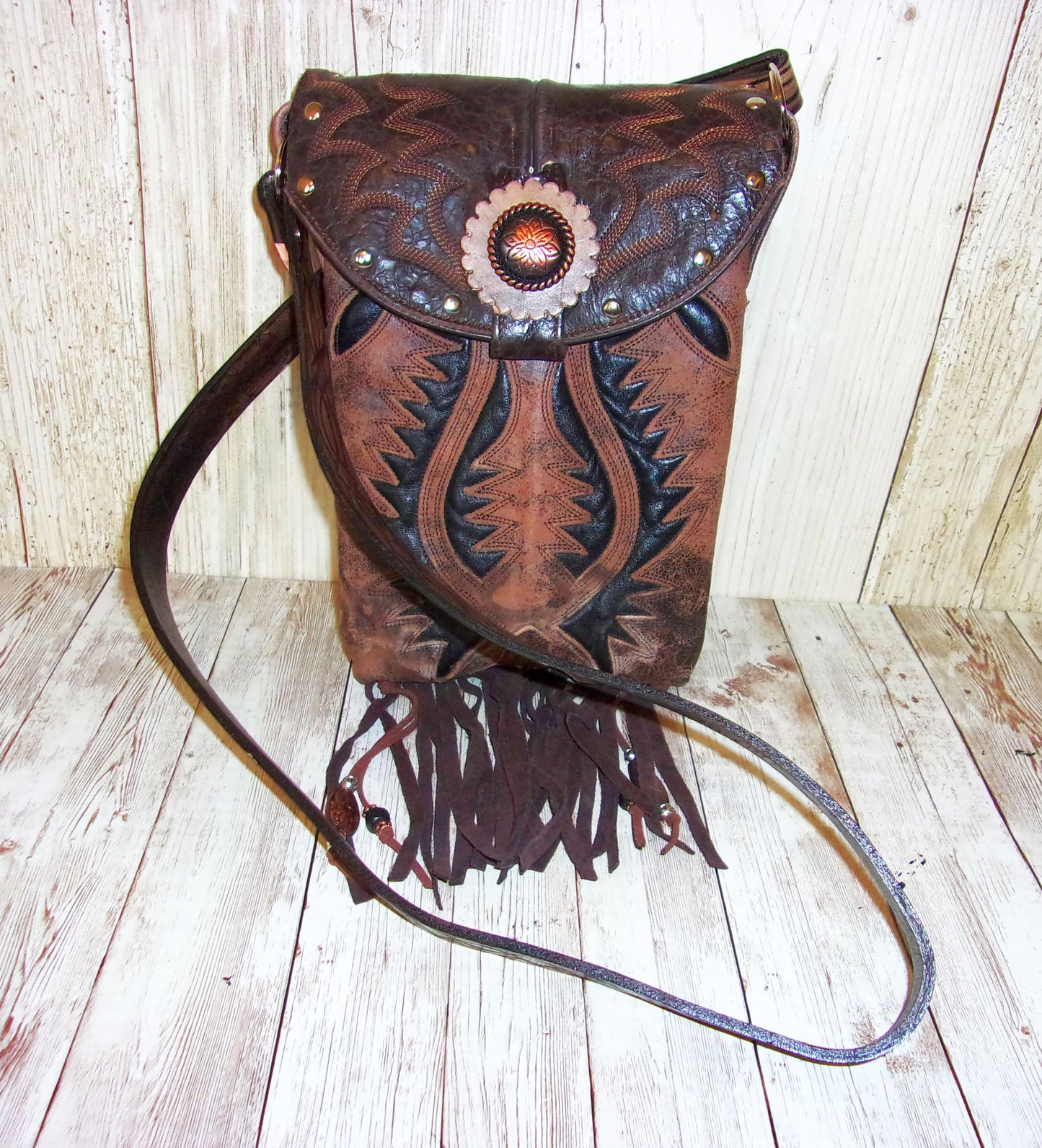 Small Concealed Carry Purse with Fringe CB110 handcrafted from cowboy boots. Shop Handbags at ChrisThompsonBags.com and buy the best 2nd amendment, conceal carry purse, concealed carry, concealed for her, concealedcarry purse, cowboy boot purse, cowgirl concealed, handgun bag, leather conceal bag, unique concealed, western conceal, western concealed at Chris Thompson Bags.