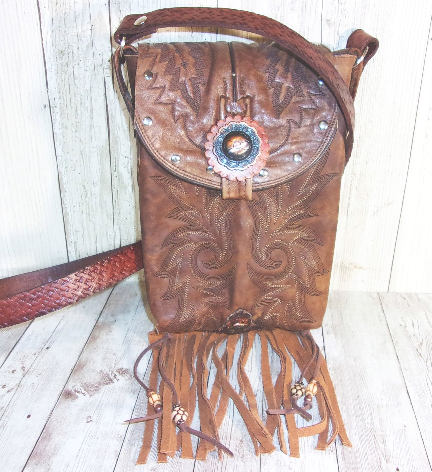 Small Concealed Carry Purse with Fringe CB53 handcrafted from cowboy boots. Shop Handbags at ChrisThompsonBags.com and buy the best 2nd amendment, conceal carry purse, concealed carry, concealed for her, concealedcarry purse, cowboy boot purse, cowgirl concealed, handgun bag, leather conceal bag, unique concealed, western conceal, western concealed at Chris Thompson Bags.