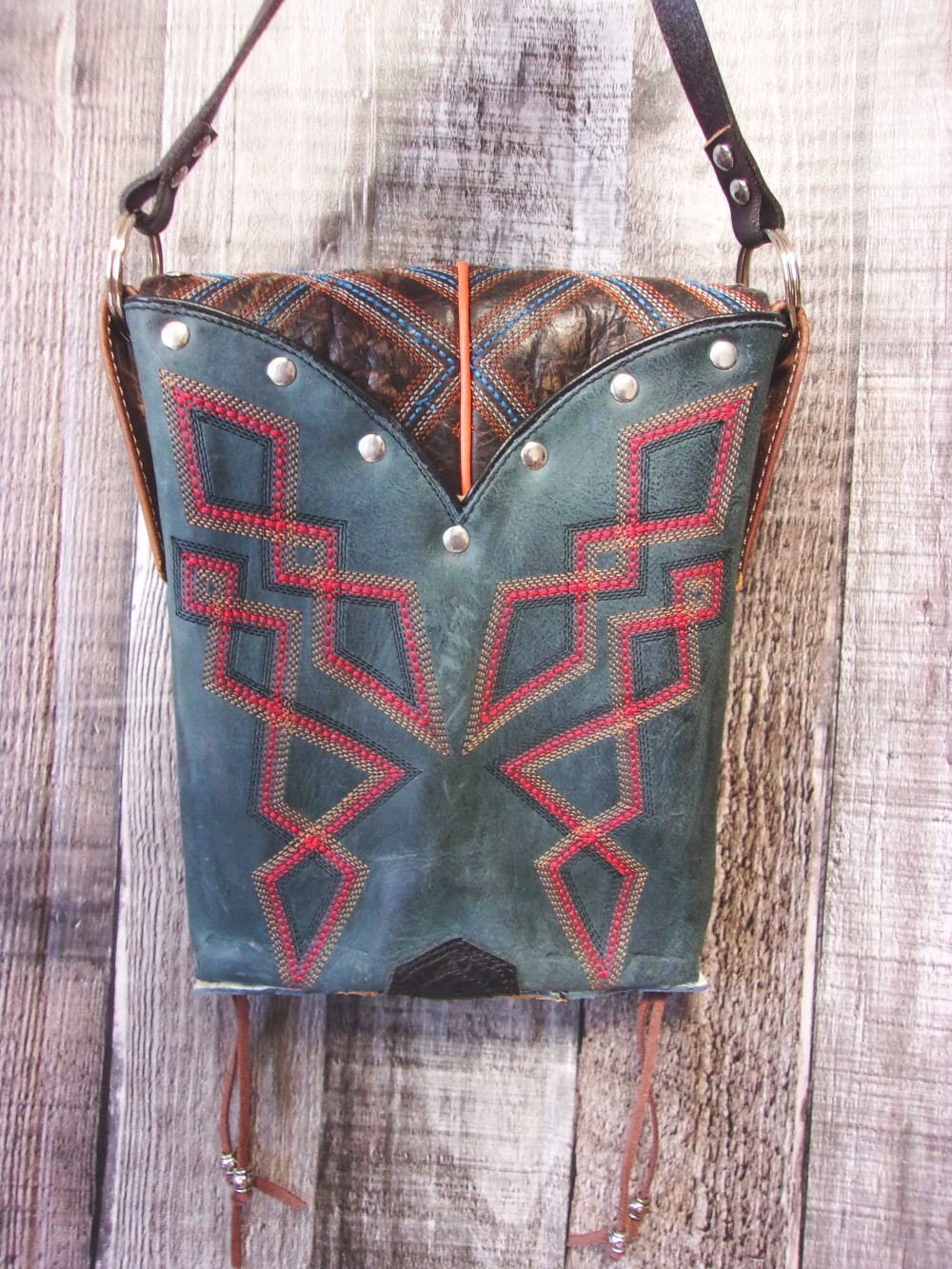 Small Cowboy Boot Purse sm242 handcrafted from cowboy boots. Shop all unique leather western handbags, purses and totes at Chris Thompson Bags