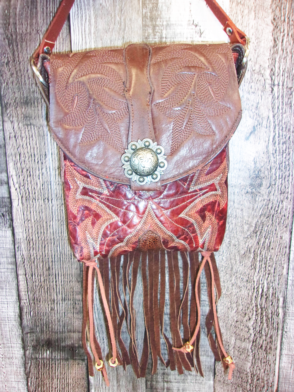 Small Cowboy Boot Purse with Fringe sm136 handcrafted from cowboy boots. Shop all unique leather western handbags, purses and totes at Chris Thompson Bags