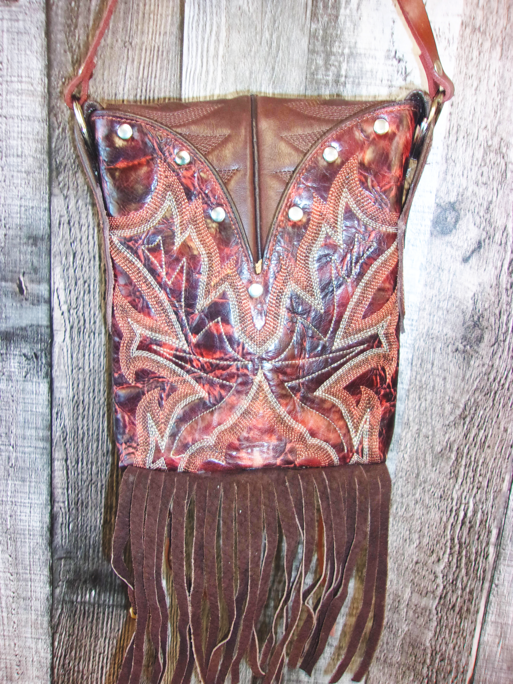 Small Cowboy Boot Purse with Fringe sm136 handcrafted from cowboy boots. Shop all unique leather western handbags, purses and totes at Chris Thompson Bags