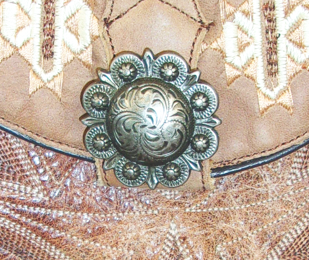 Small Cowboy Boot Purse with Fringe sm147 handcrafted from cowboy boots. Shop all unique leather western handbags, purses and totes at Chris Thompson Bags