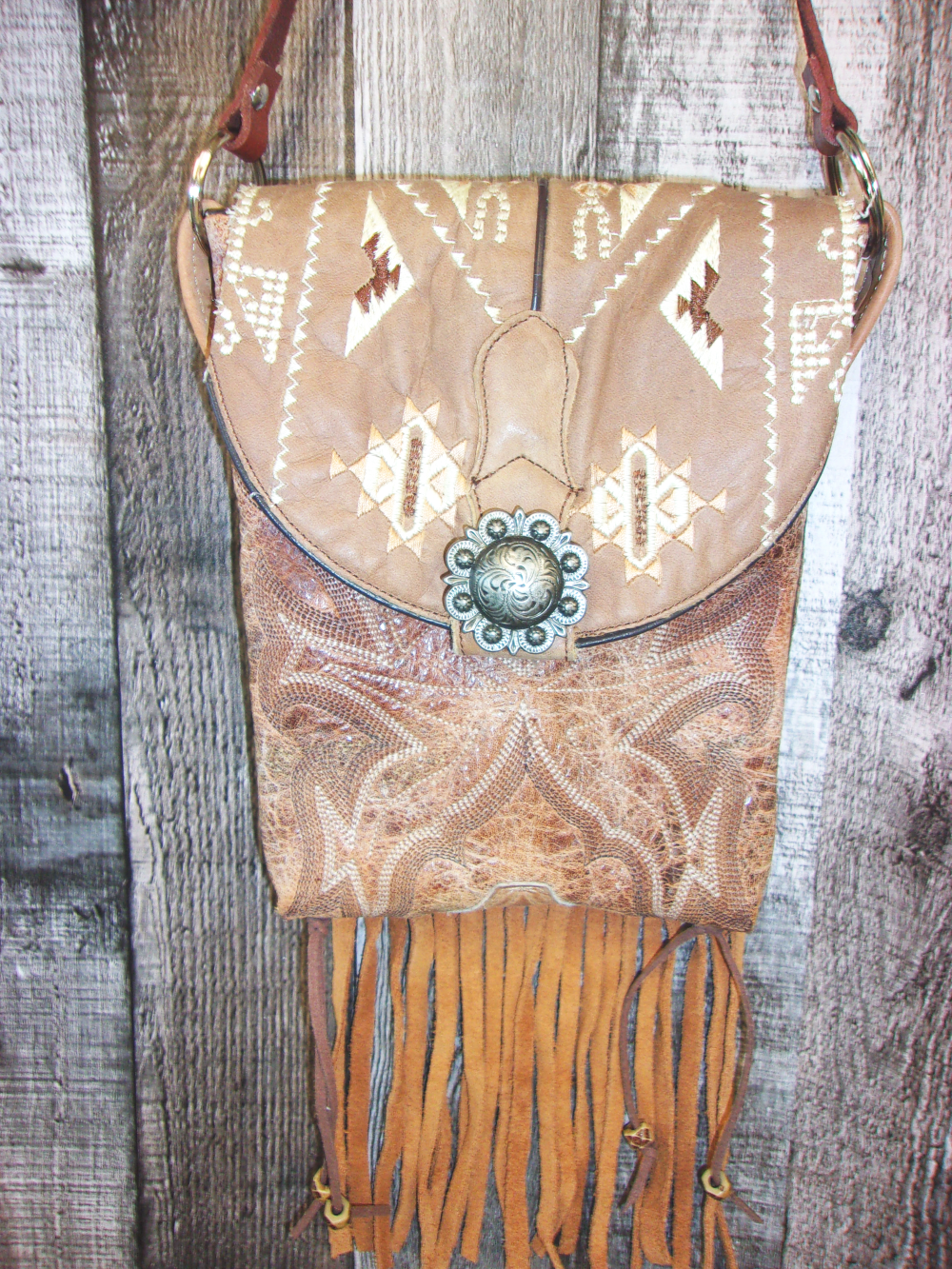 Small Cowboy Boot Purse with Fringe sm147 handcrafted from cowboy boots. Shop all unique leather western handbags, purses and totes at Chris Thompson Bags