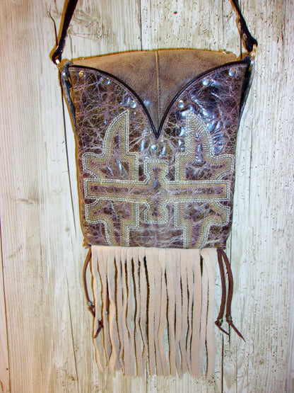 Small Cowboy Boot Purse with Fringe sm219 handcrafted from cowboy boots. Shop all unique leather western handbags, purses and totes at Chris Thompson Bags