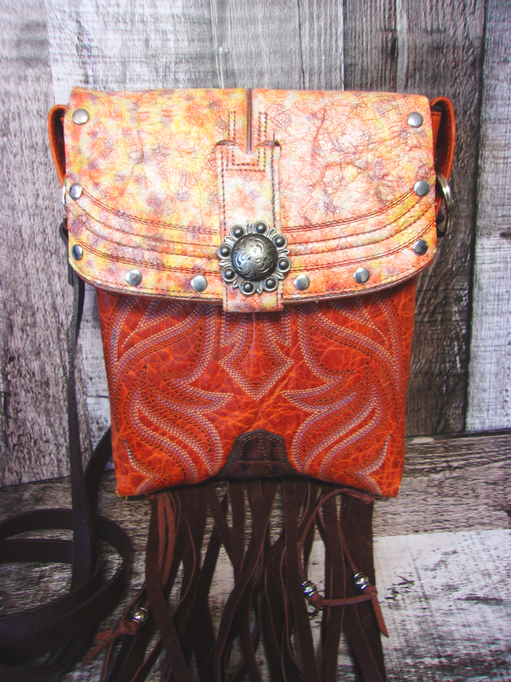 Small Cowboy Boot Purse with Fringe sm234 handcrafted from cowboy boots. Shop all unique leather western handbags, purses and totes at Chris Thompson Bags