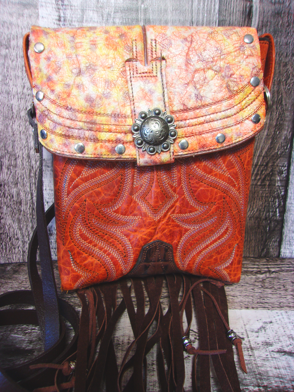 Small Cowboy Boot Purse with Fringe sm234 handcrafted from cowboy boots. Shop all unique leather western handbags, purses and totes at Chris Thompson Bags