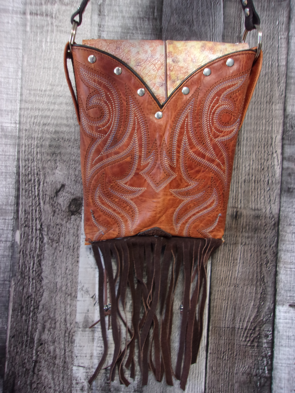 Small Cowboy Boot Purse with Fringe sm234 handcrafted from cowboy boots. Shop all unique leather western handbags, purses and totes at Chris Thompson Bags