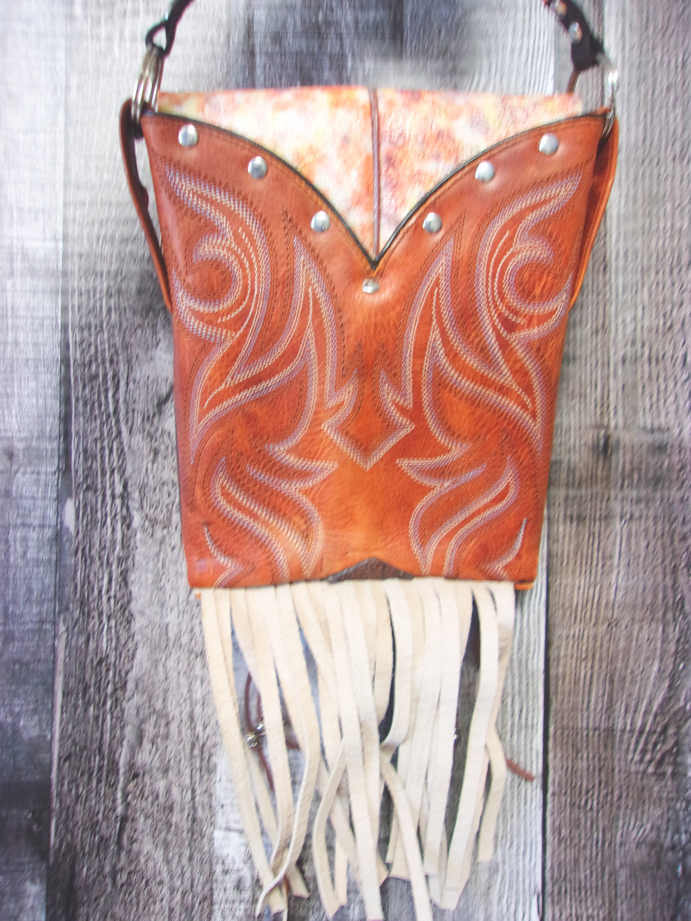 Small Cowboy Boot Purse with Fringe sm237 handcrafted from cowboy boots. Shop all unique leather western handbags, purses and totes at Chris Thompson Bags