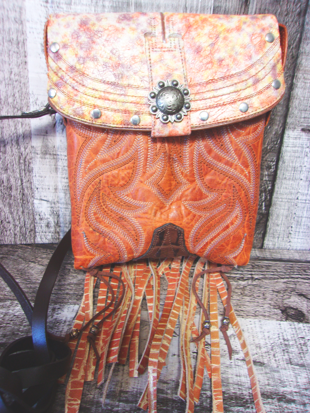Small Cowboy Boot Purse with Fringe sm237 handcrafted from cowboy boots. Shop all unique leather western handbags, purses and totes at Chris Thompson Bags